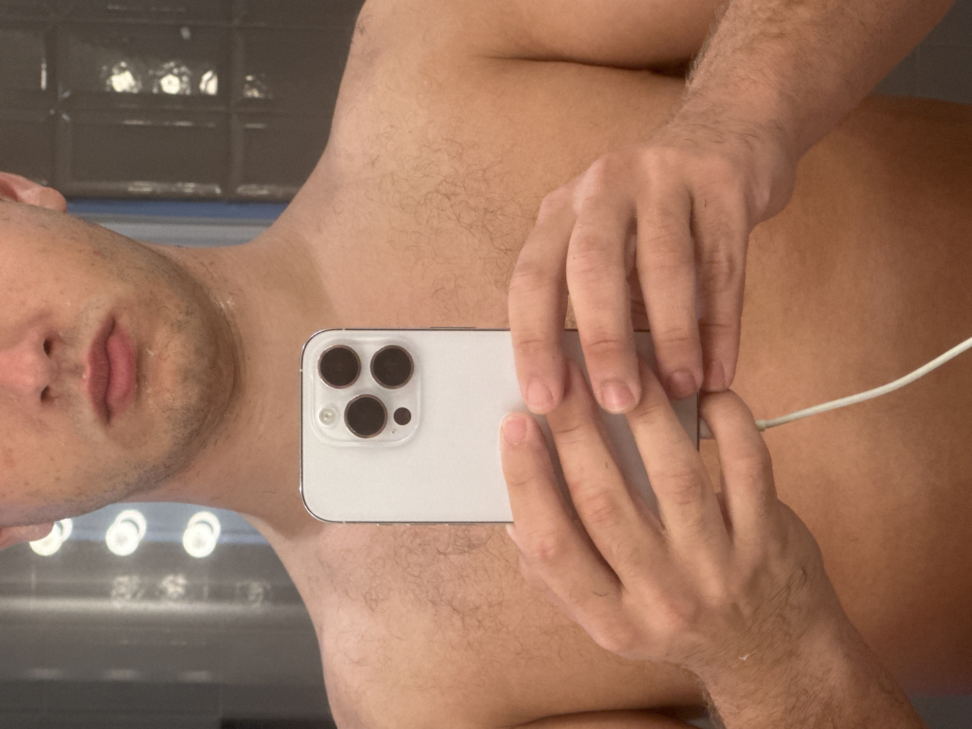 Milan resident captures selfie while charging iPhone
