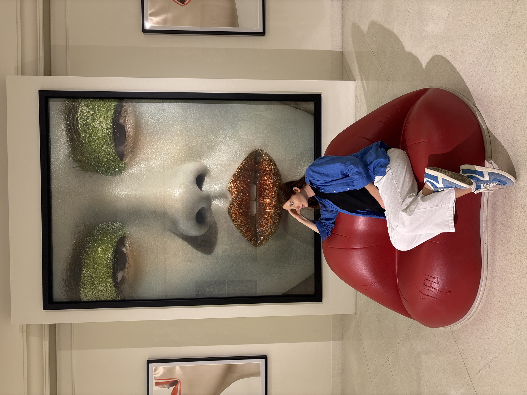 Art gallery visitors view paintings and sculptures in Bangkok