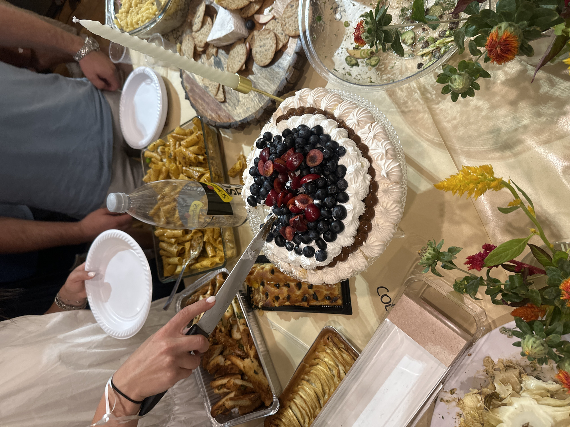 Evening celebration with food and cake in Tel Aviv