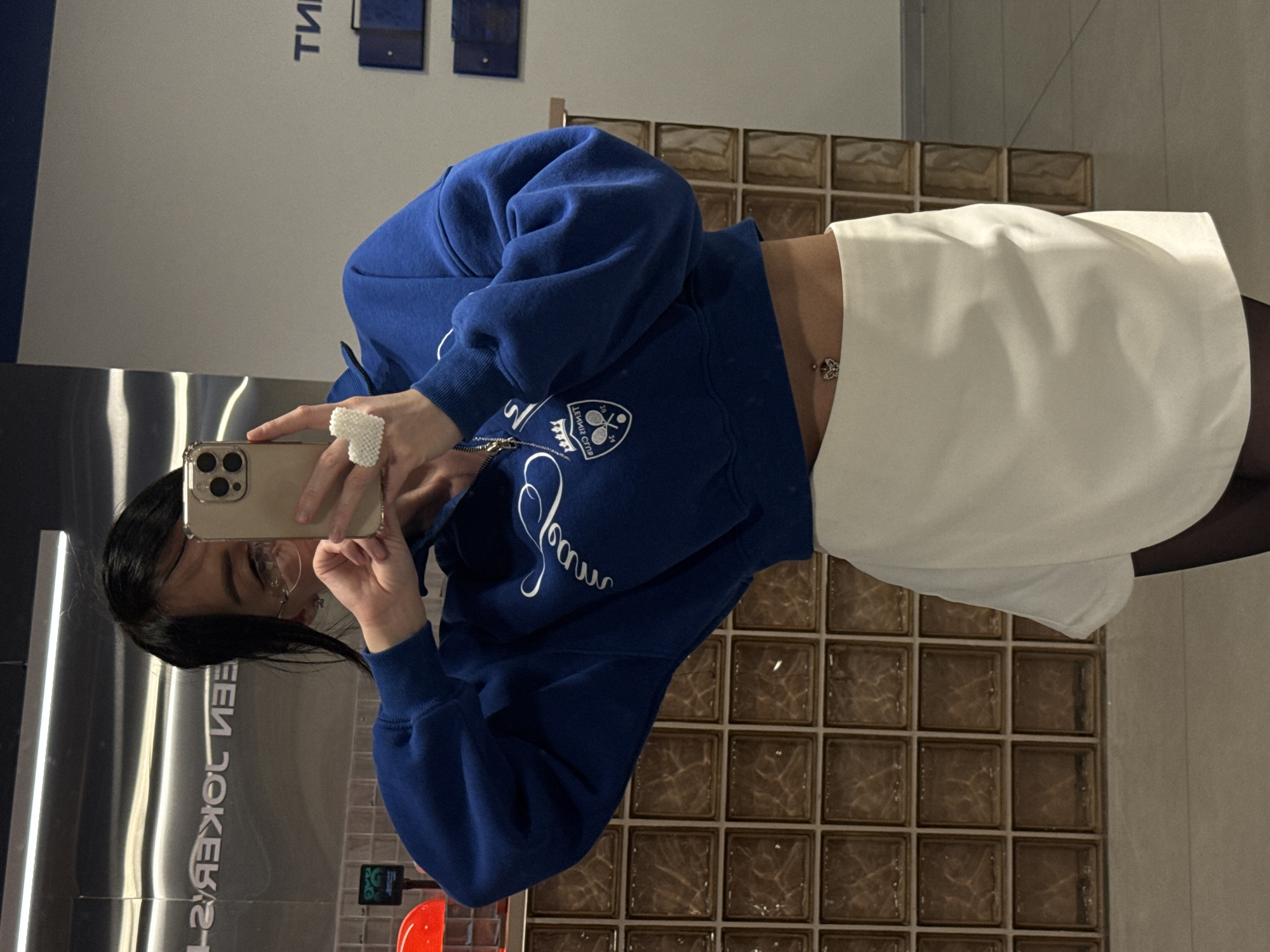 Woman takes selfies while shopping in Krasnoyarsk store