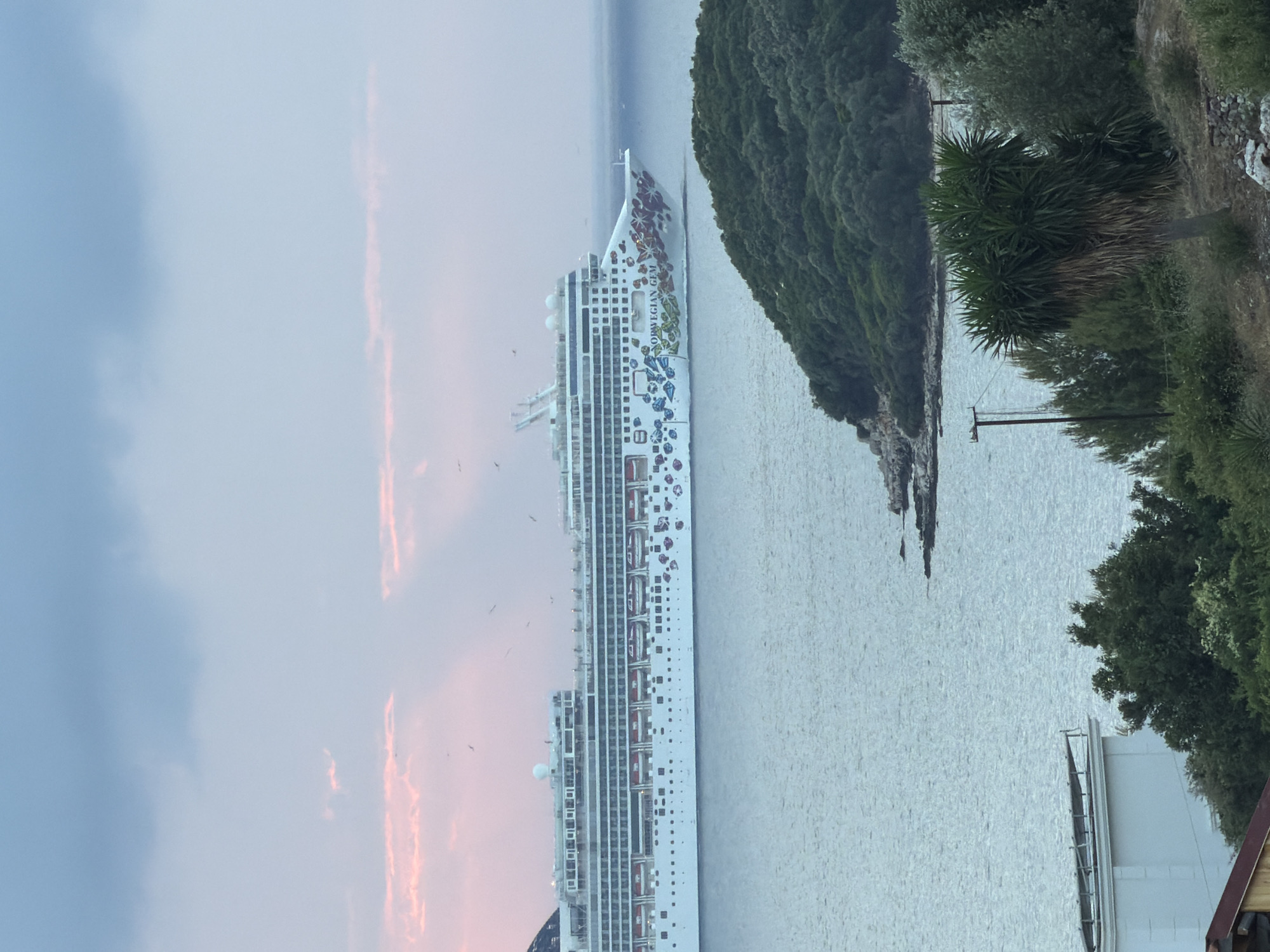 Two cruise ships anchor off Albanian coast during sunset