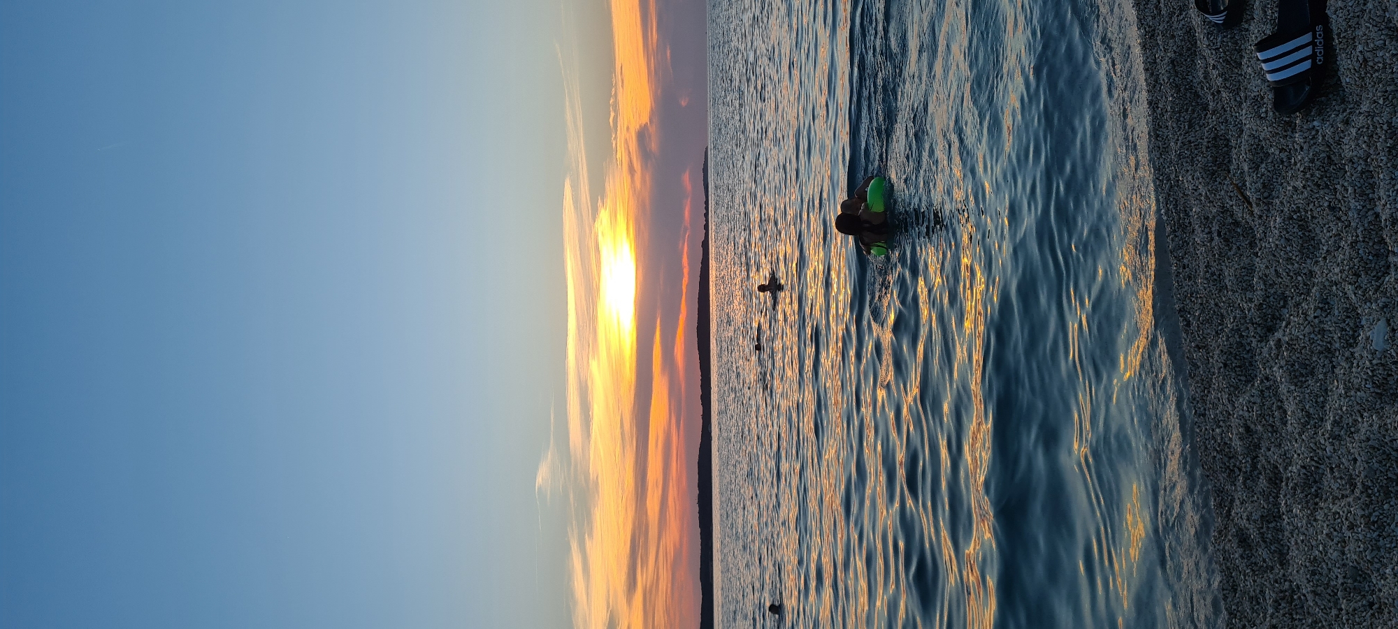 Pebble beach sunset hang in Pula, Croatia