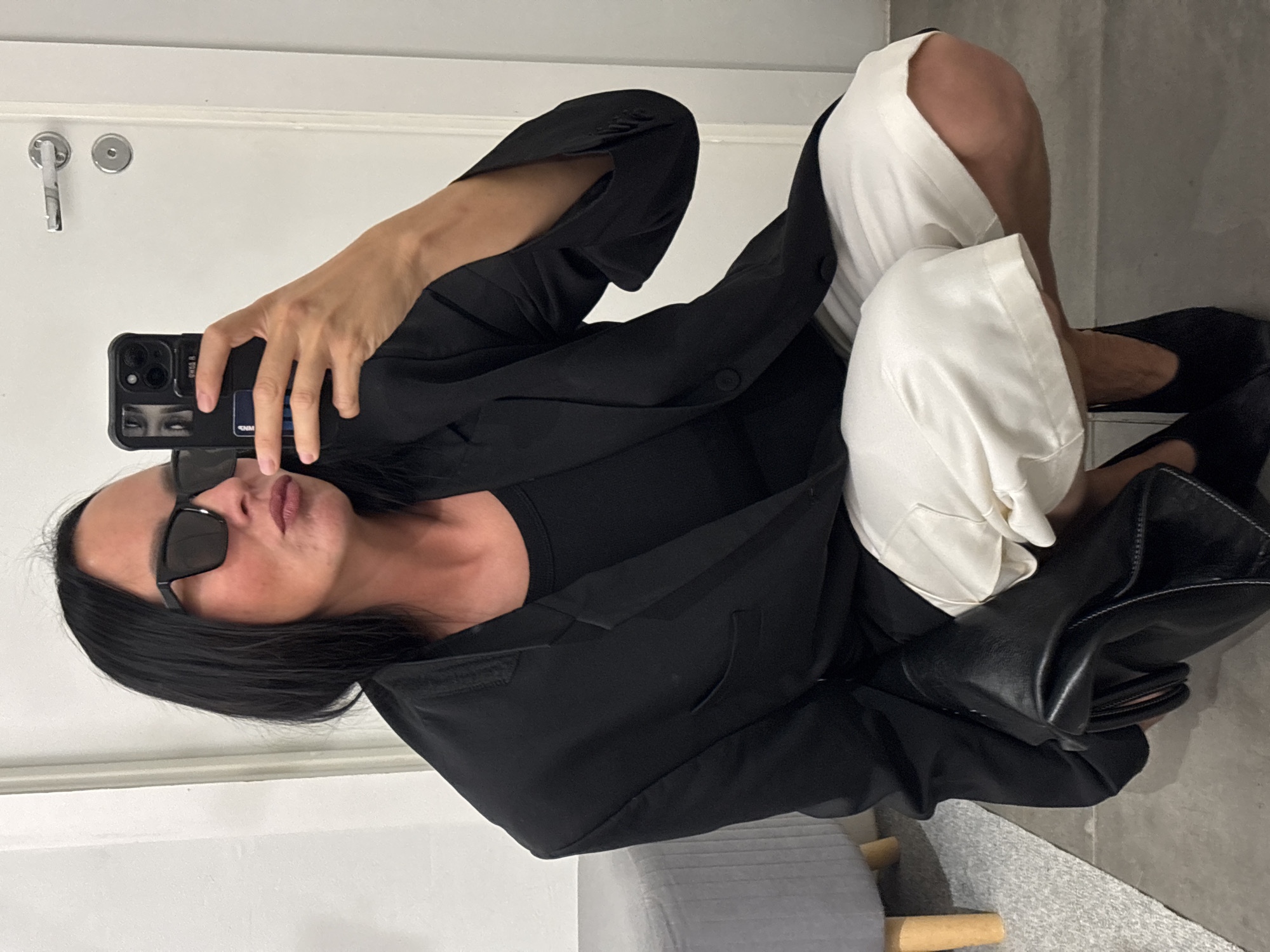 Woman documents outfit styling session across Chaikovsky locations
