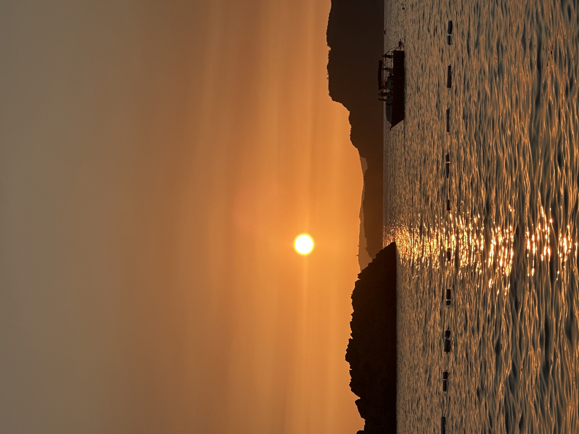 Golden sunset over Sveti Stefan and the Adriatic Sea