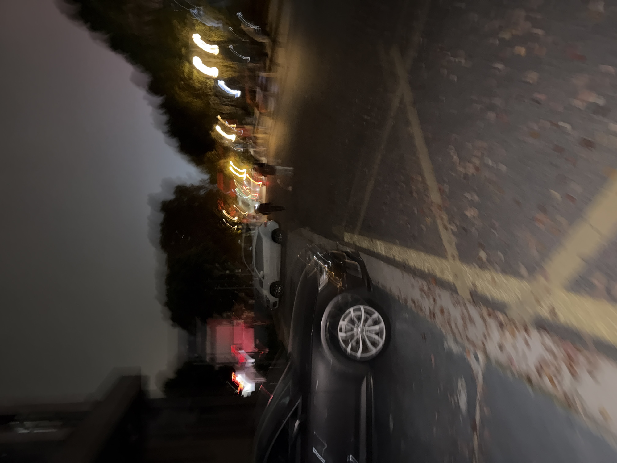 Nighttime street parking scene captured in Jiangning District