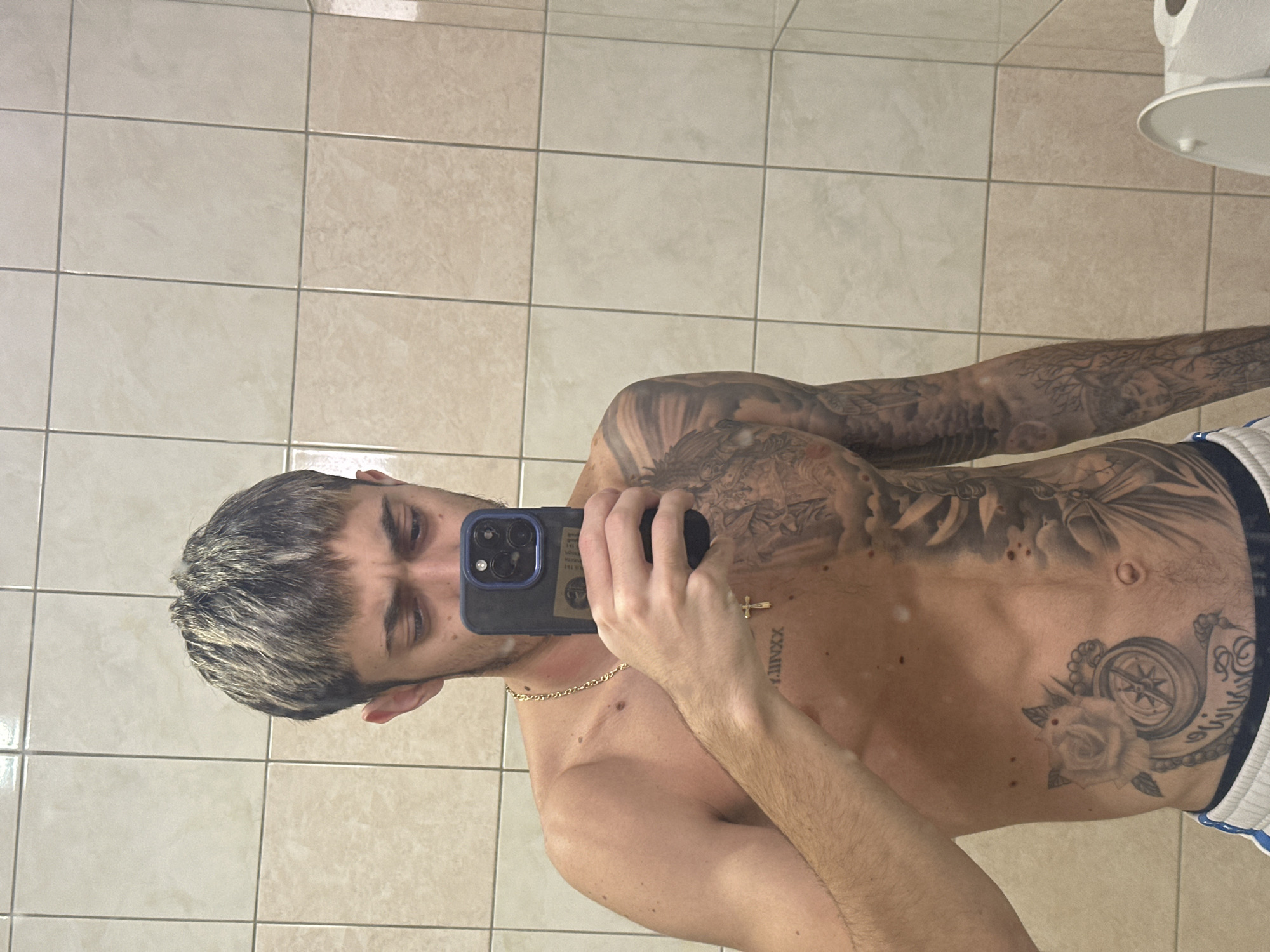 Man takes bathroom selfie in Varna, Bulgaria