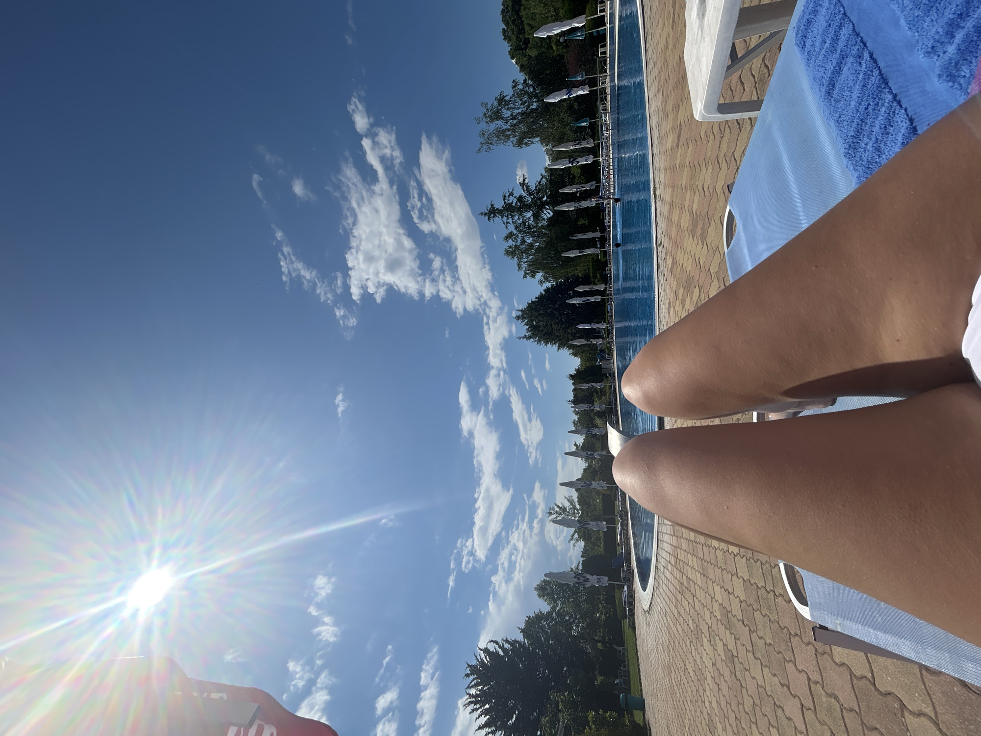 Lazy afternoon at a hotel pool on a sunny day