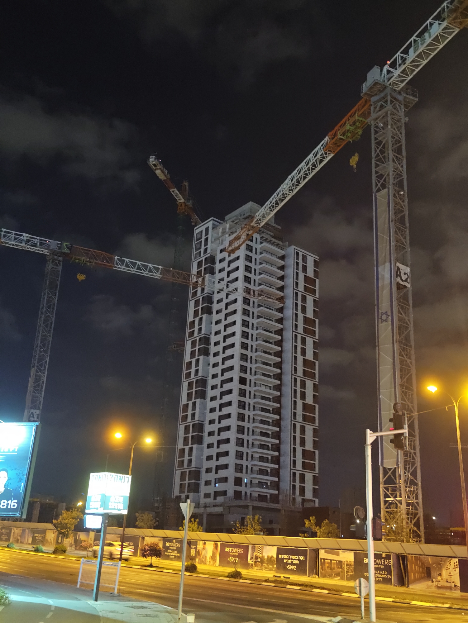 Nighttime construction zone and streetscape in Petah Tikva