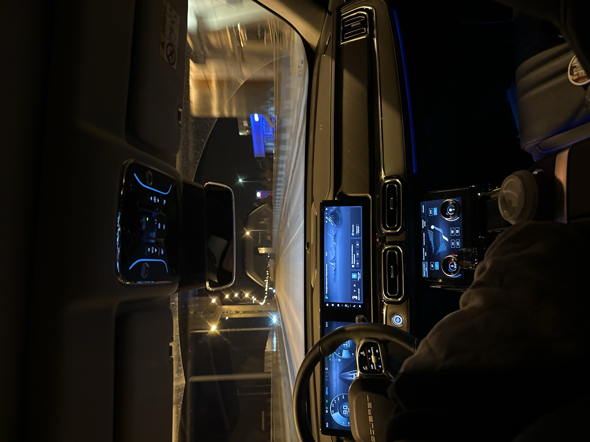 Nighttime drive through Perm captured from vehicle interior