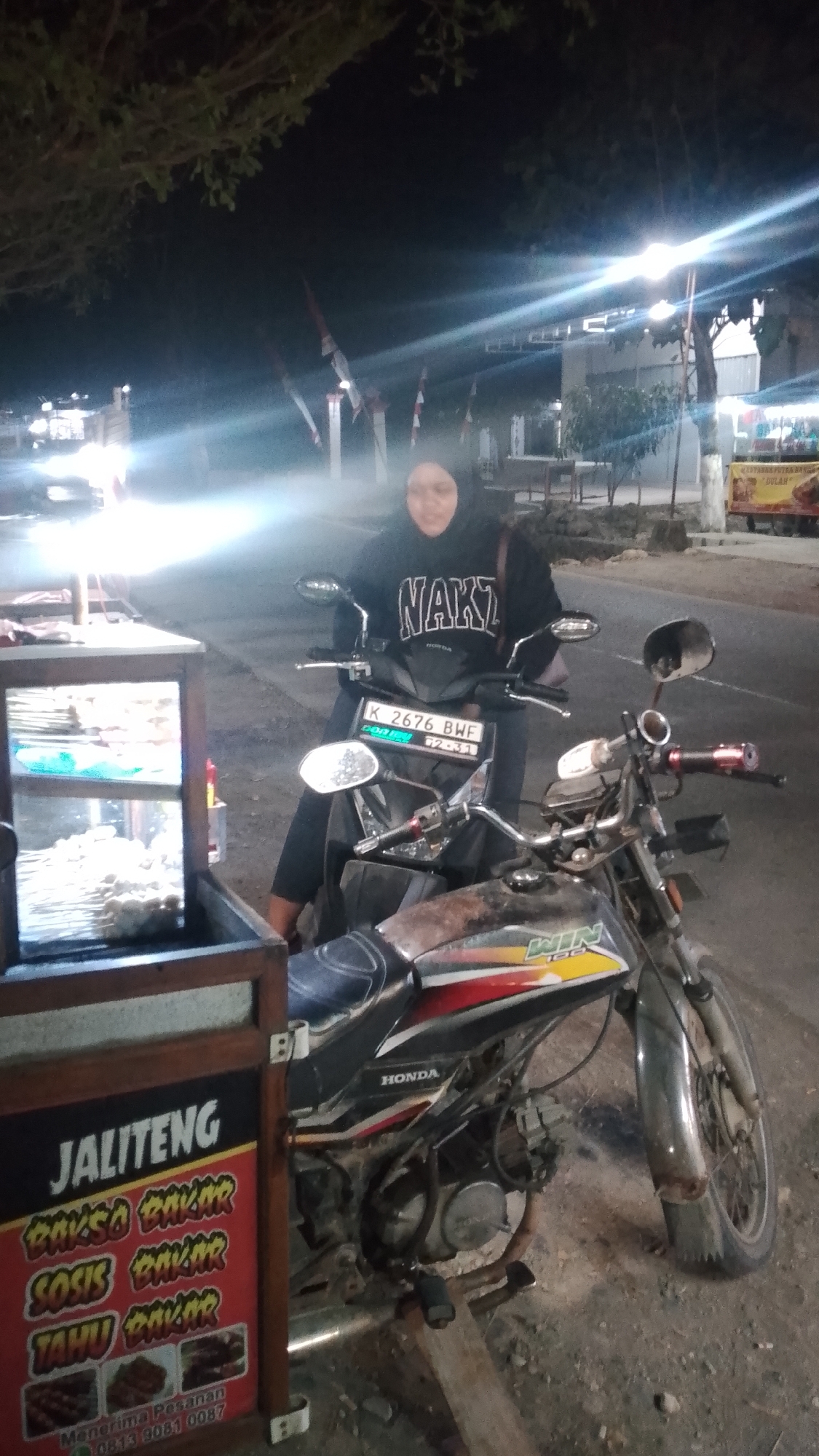Late-night street food and moto scene in Karanglangu