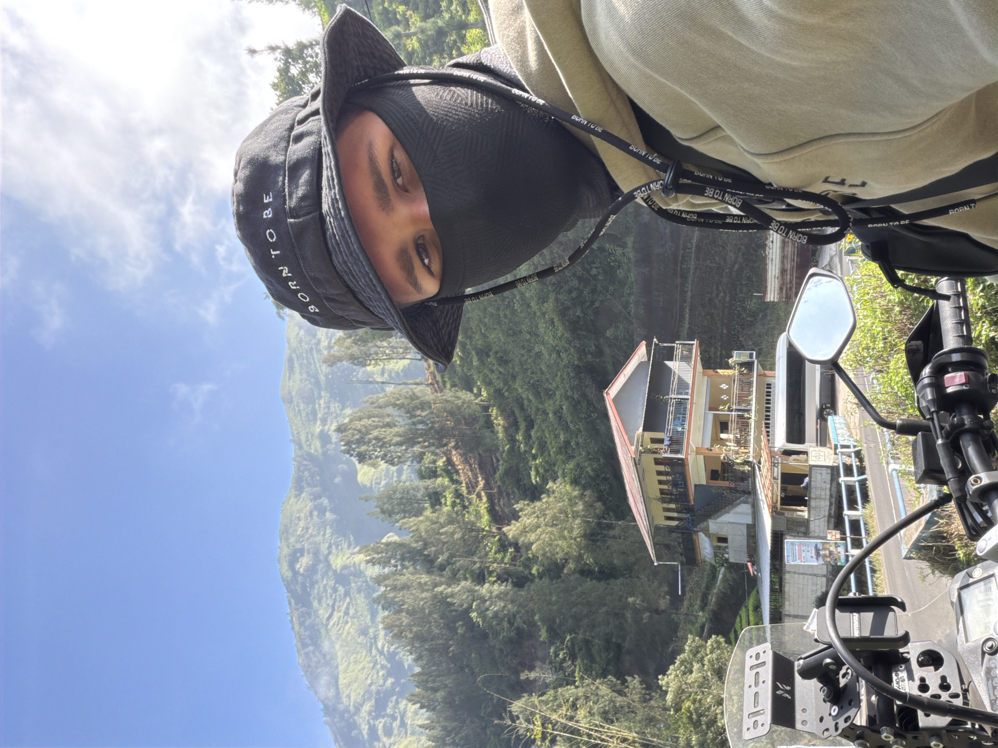 Roadside selfie stop along a mountain route in Wonokerto
