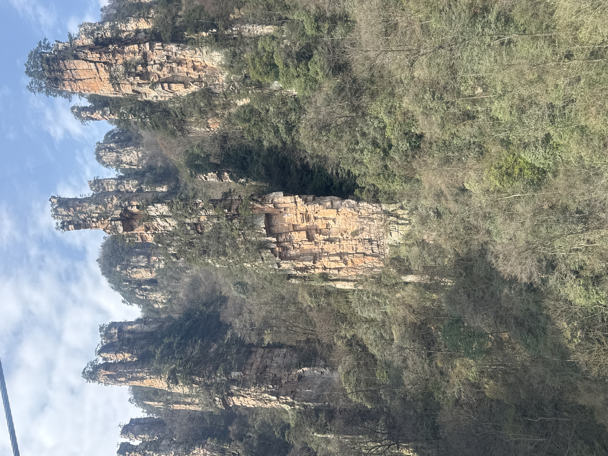 Cable cars operate through Wulingyuan's sandstone formations