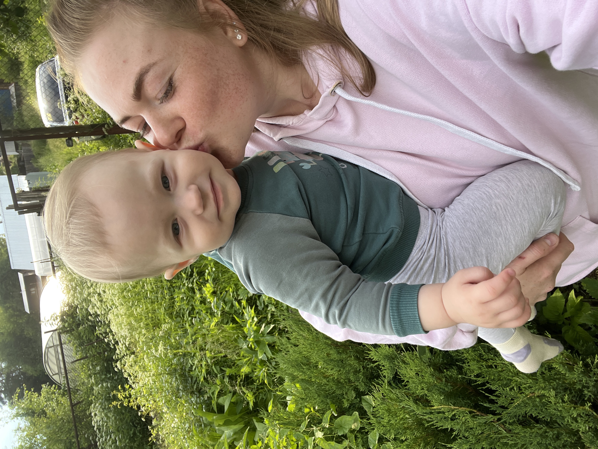 Tender outdoor moment with a baby in Chaikovsky