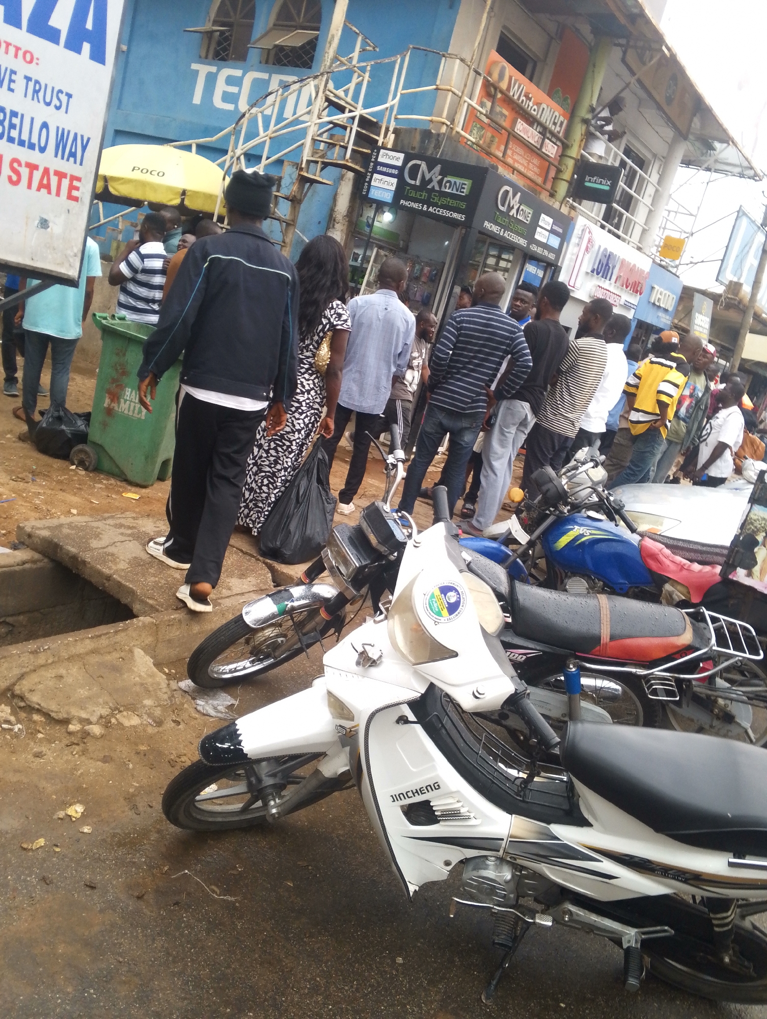 Ordinary street life documented in Jos commercial district