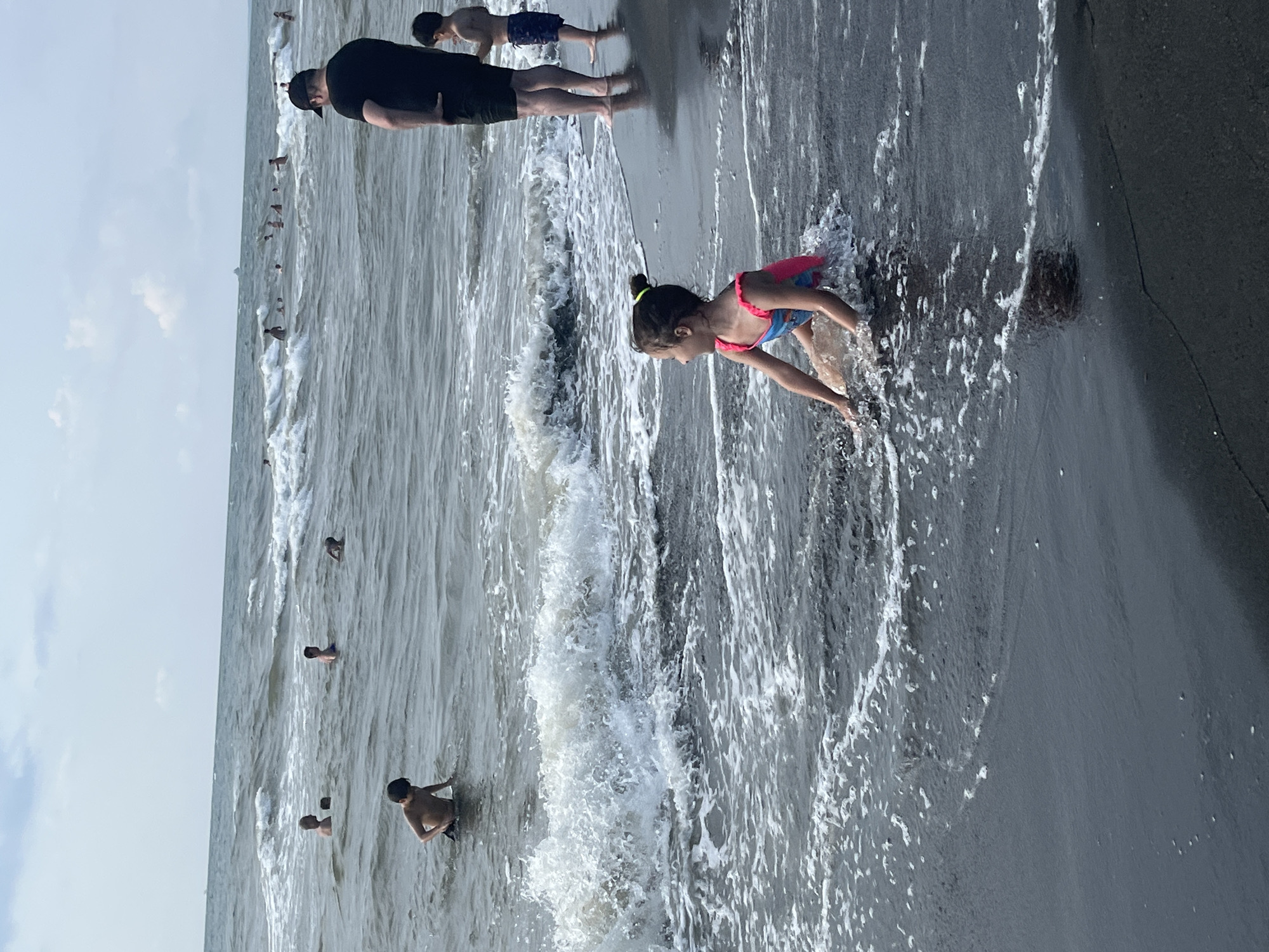 Summer day on Ureki's black sand beach and backstreets