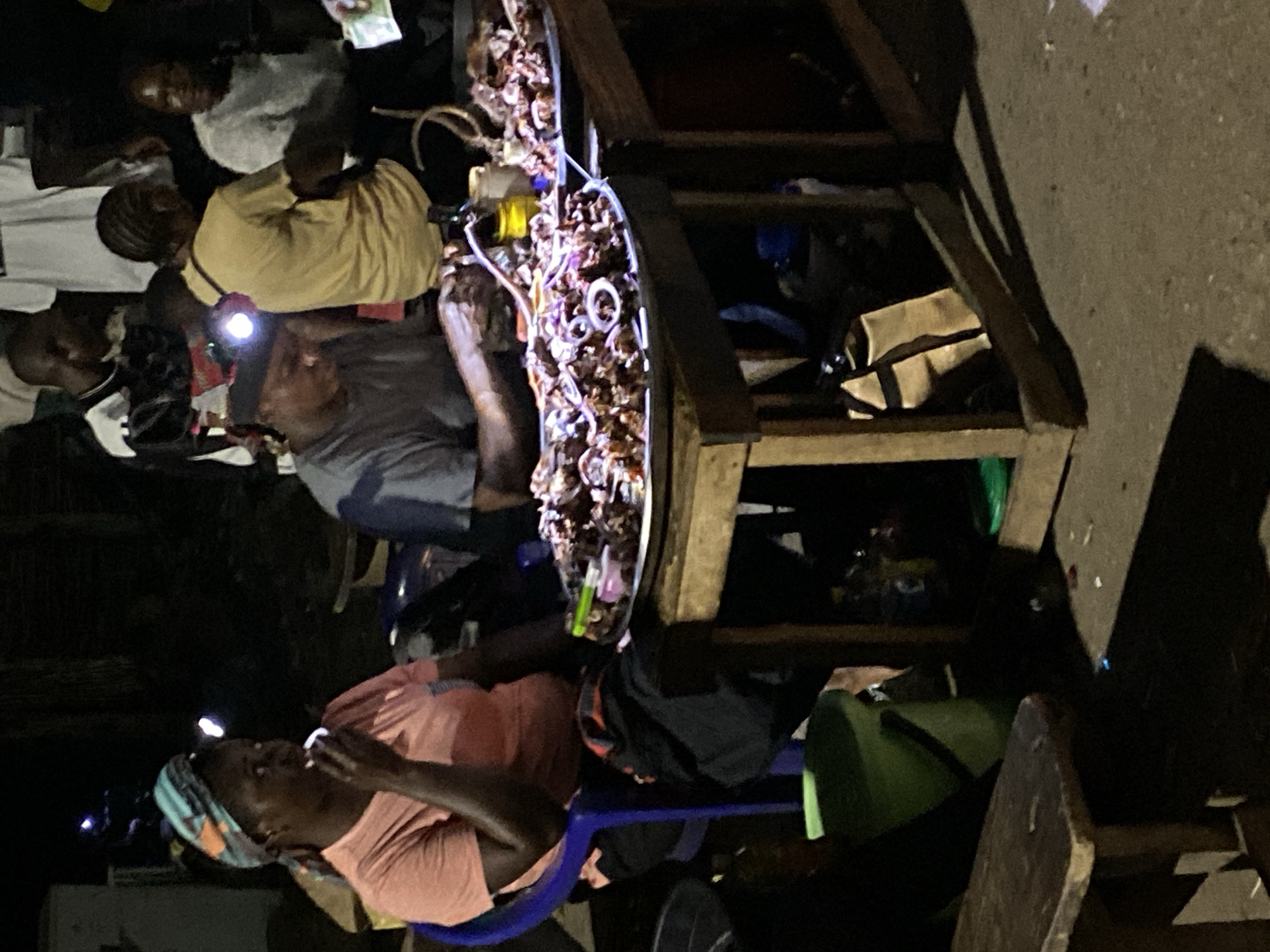 Evening street food gathering draws customers in Bukuru, Nigeria