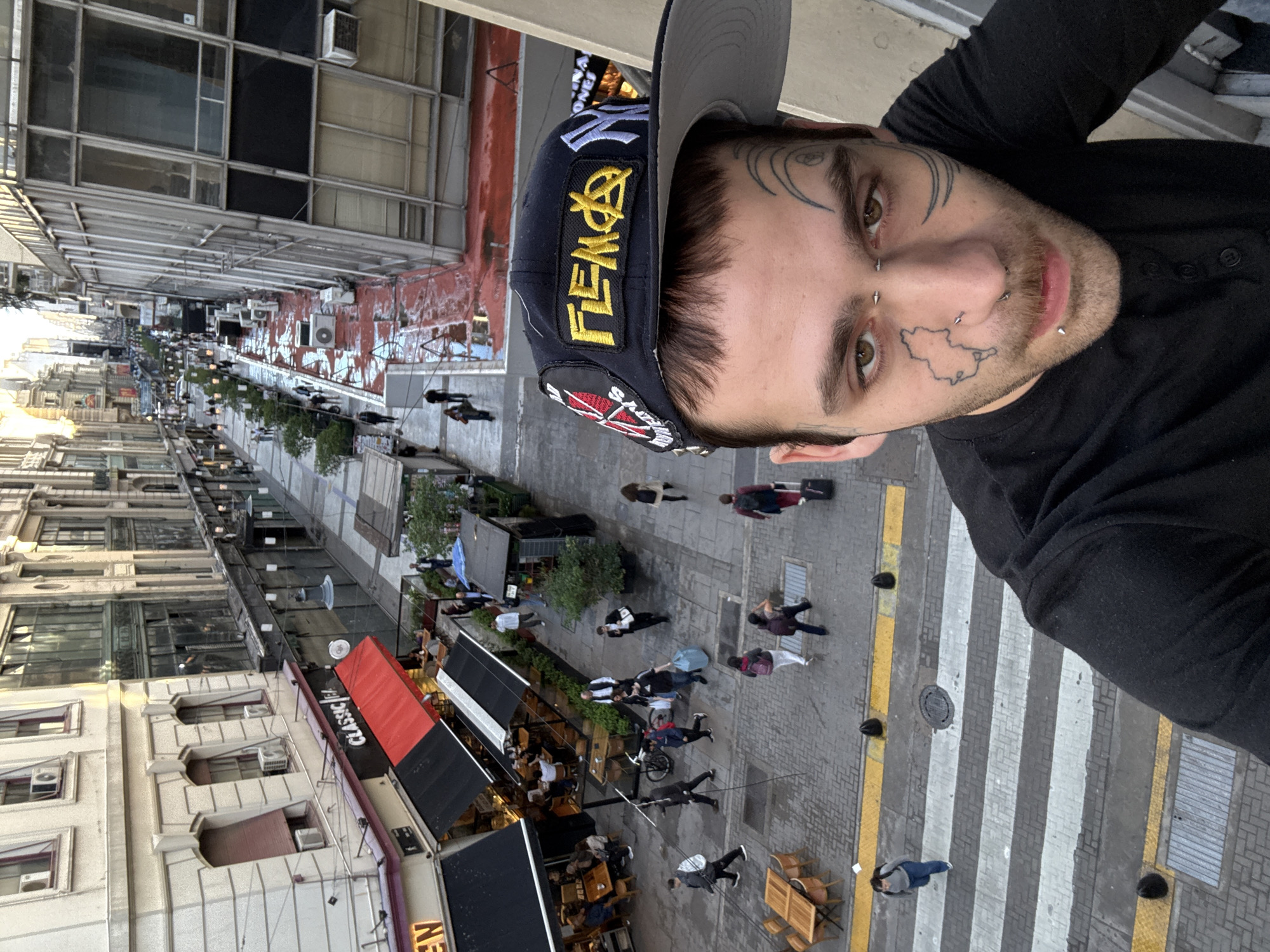 Man Takes Selfie from Elevated Position in Buenos Aires