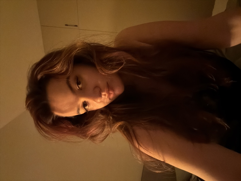 Woman photographed in intimate bedroom portraits in Budva