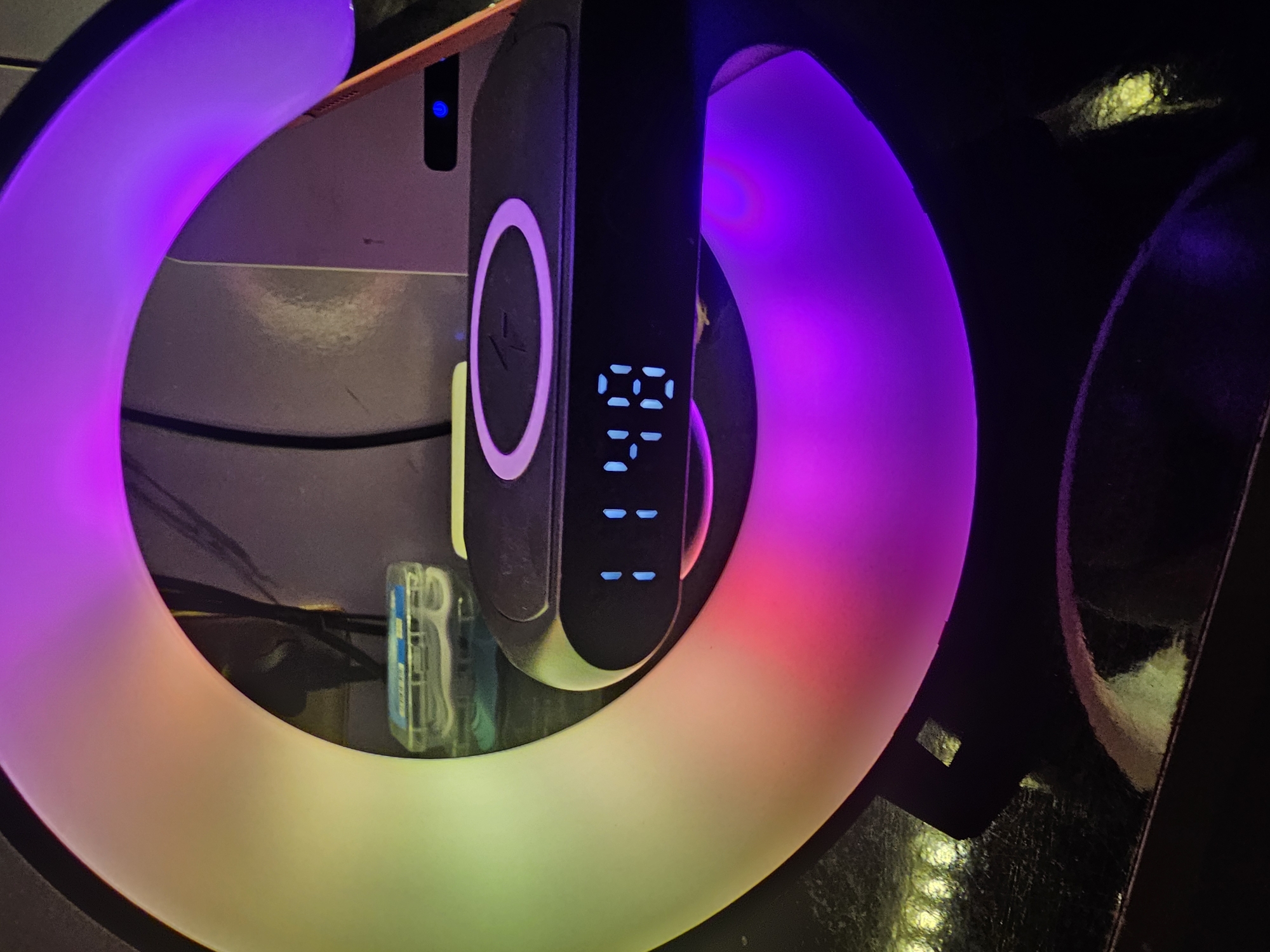Electronic device with timer display and colorful light ring observed