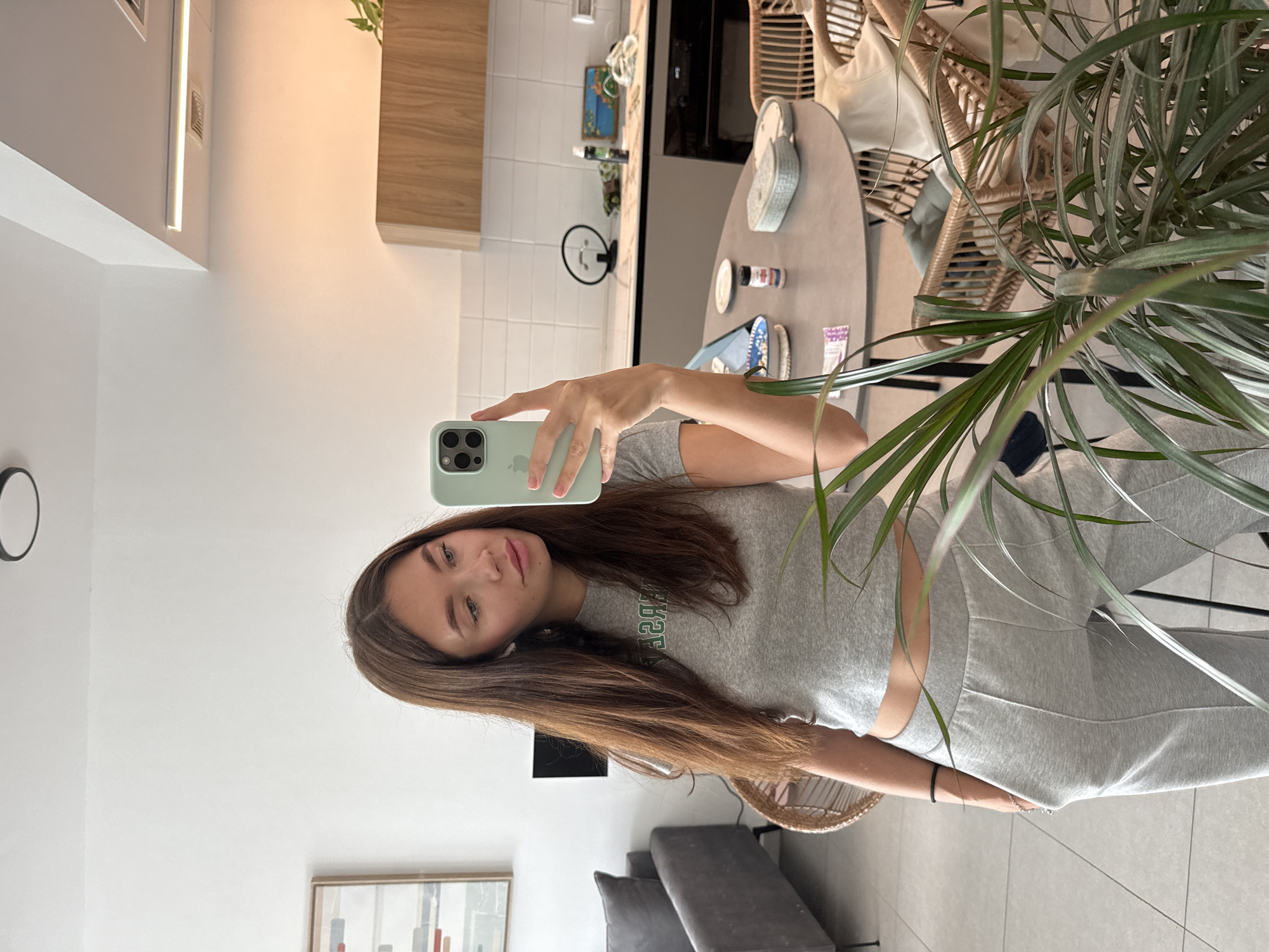 Woman takes morning selfie in Ramat Gan apartment