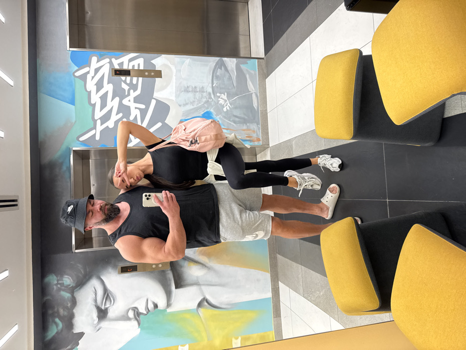 Couple takes mirror selfie in Dubai public space