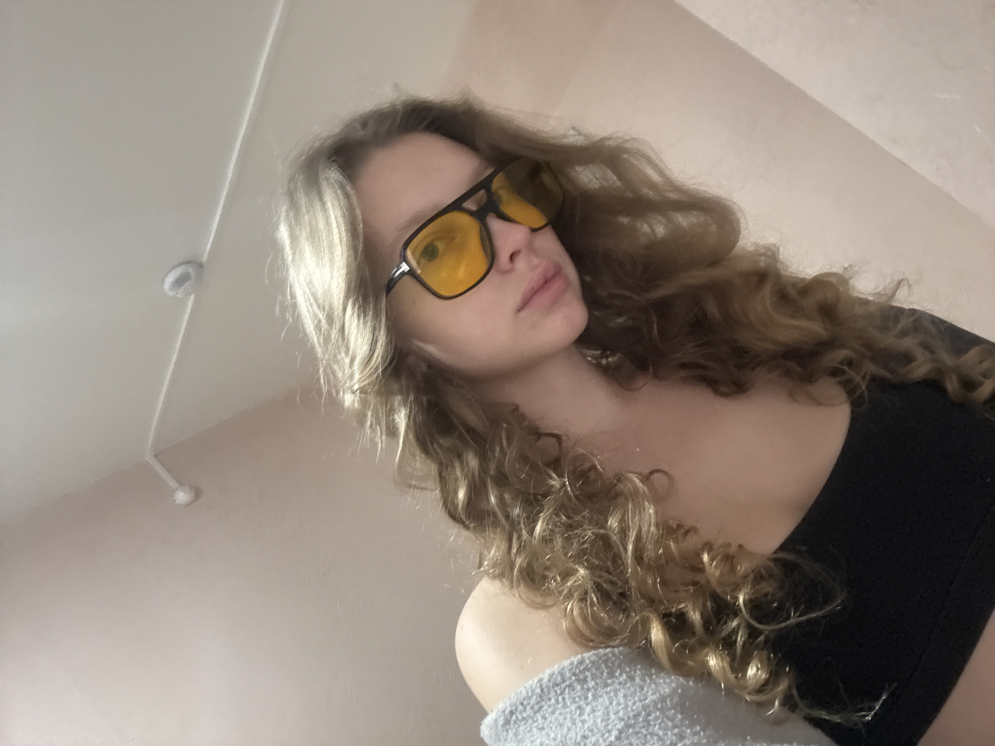 Woman documents morning selfie session in Izhevsk apartment