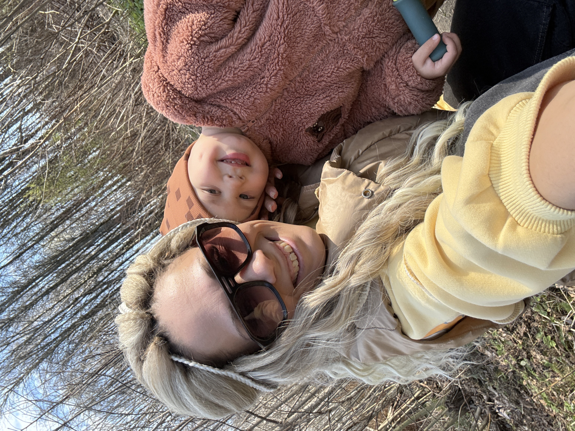 Woman and child enjoy outdoor time in Rusanovo forest