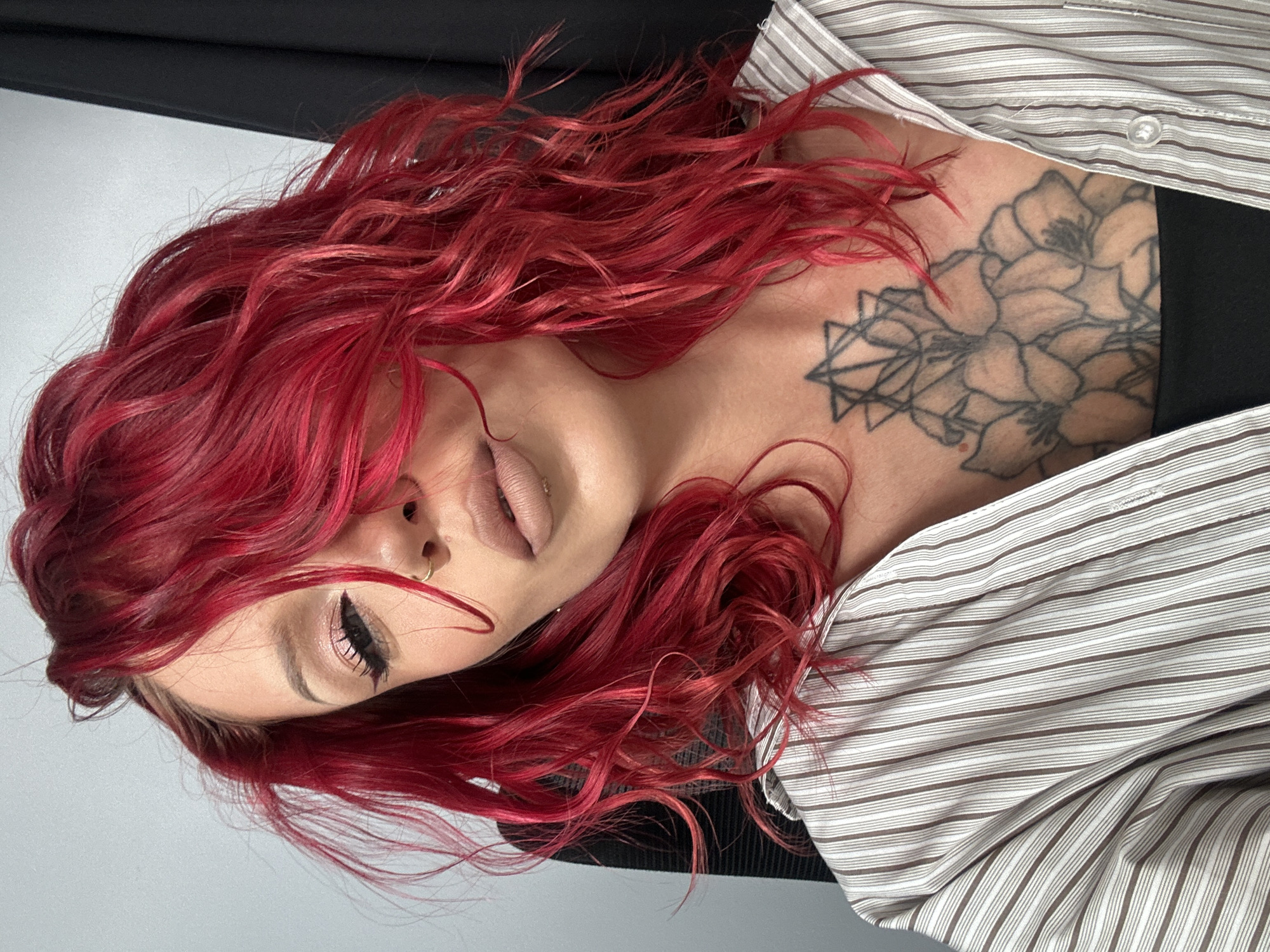 Red-haired woman photographed in portrait session, North Kuta