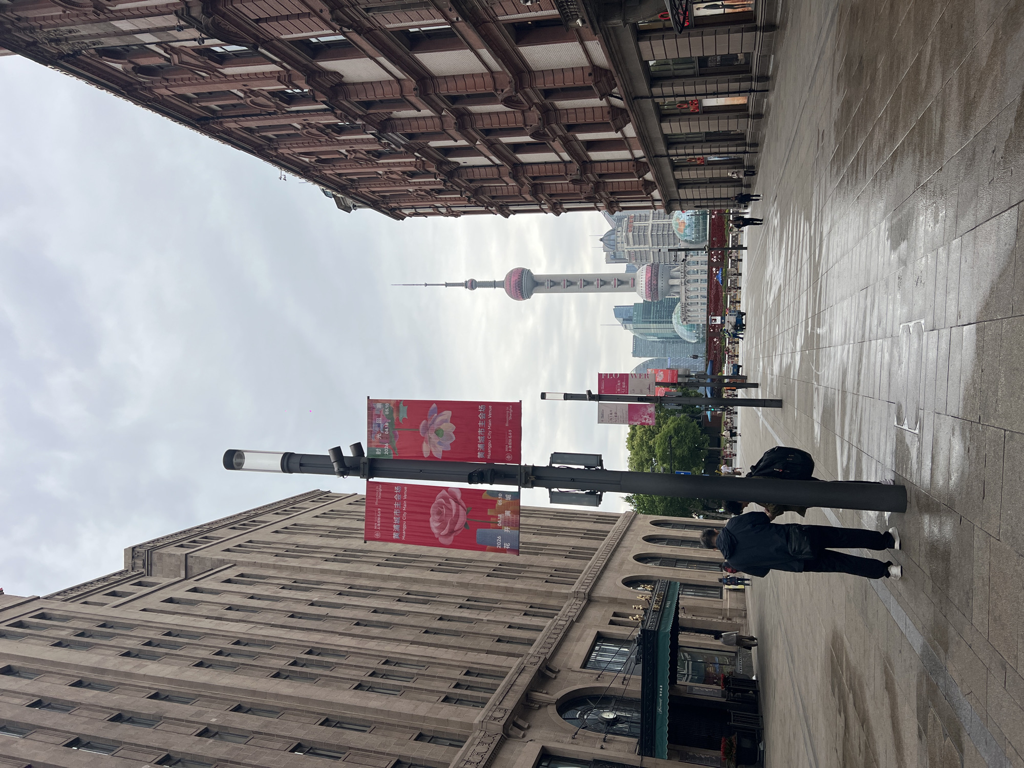 Shanghai street views feature Oriental Pearl Tower, flags