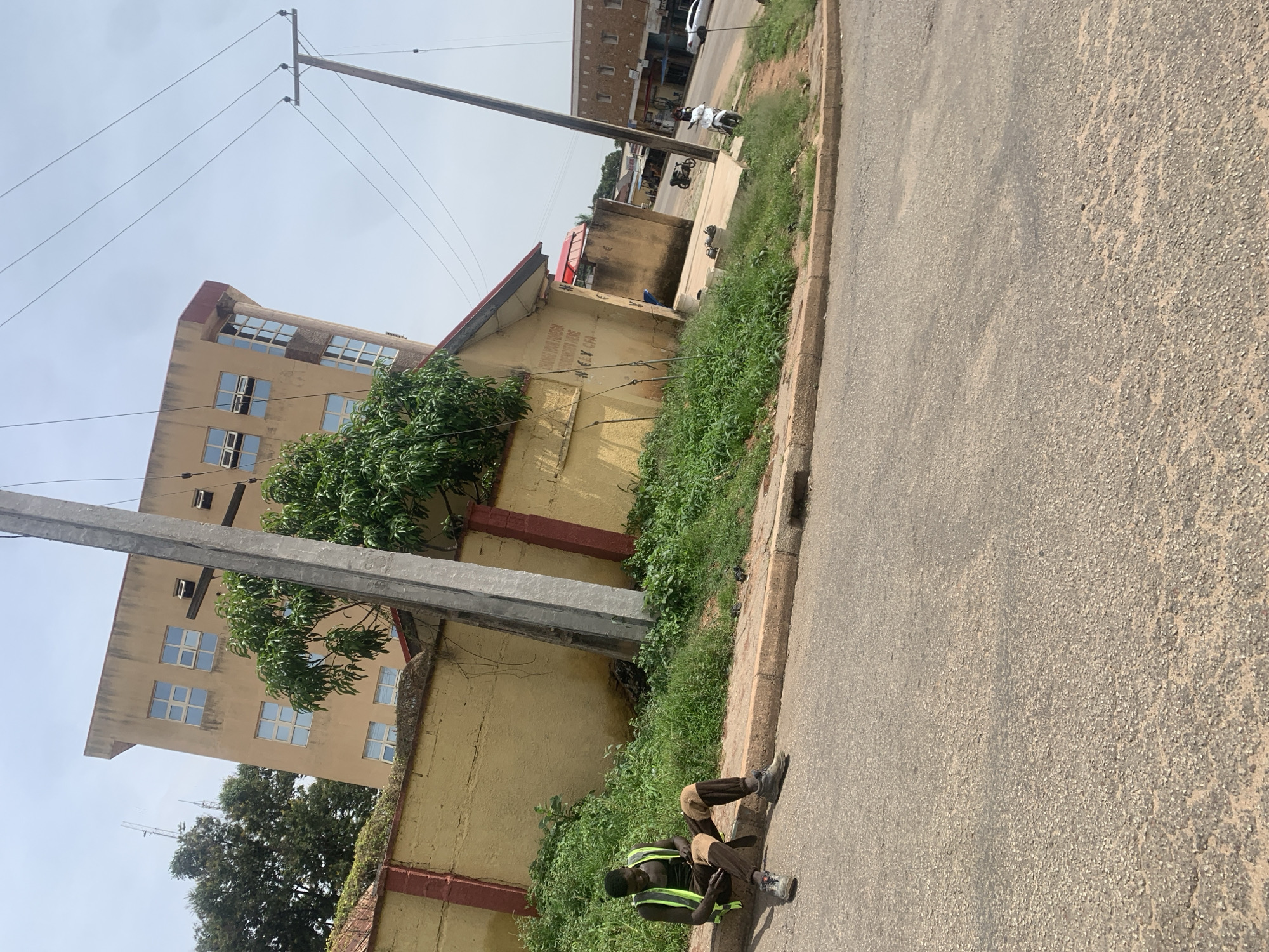 Inside and outside a Keke Napep on the streets of Jos