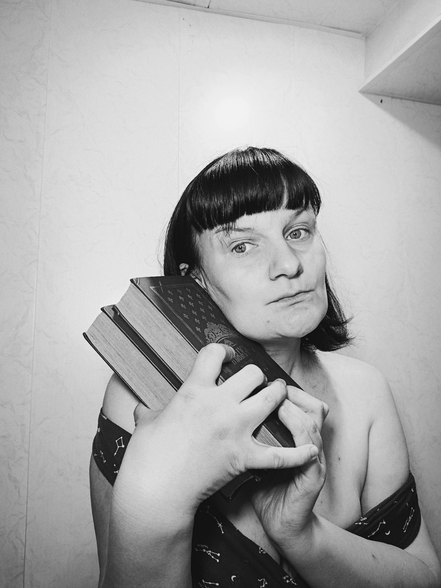 Books and toddler photographed in Фоки, Russia home