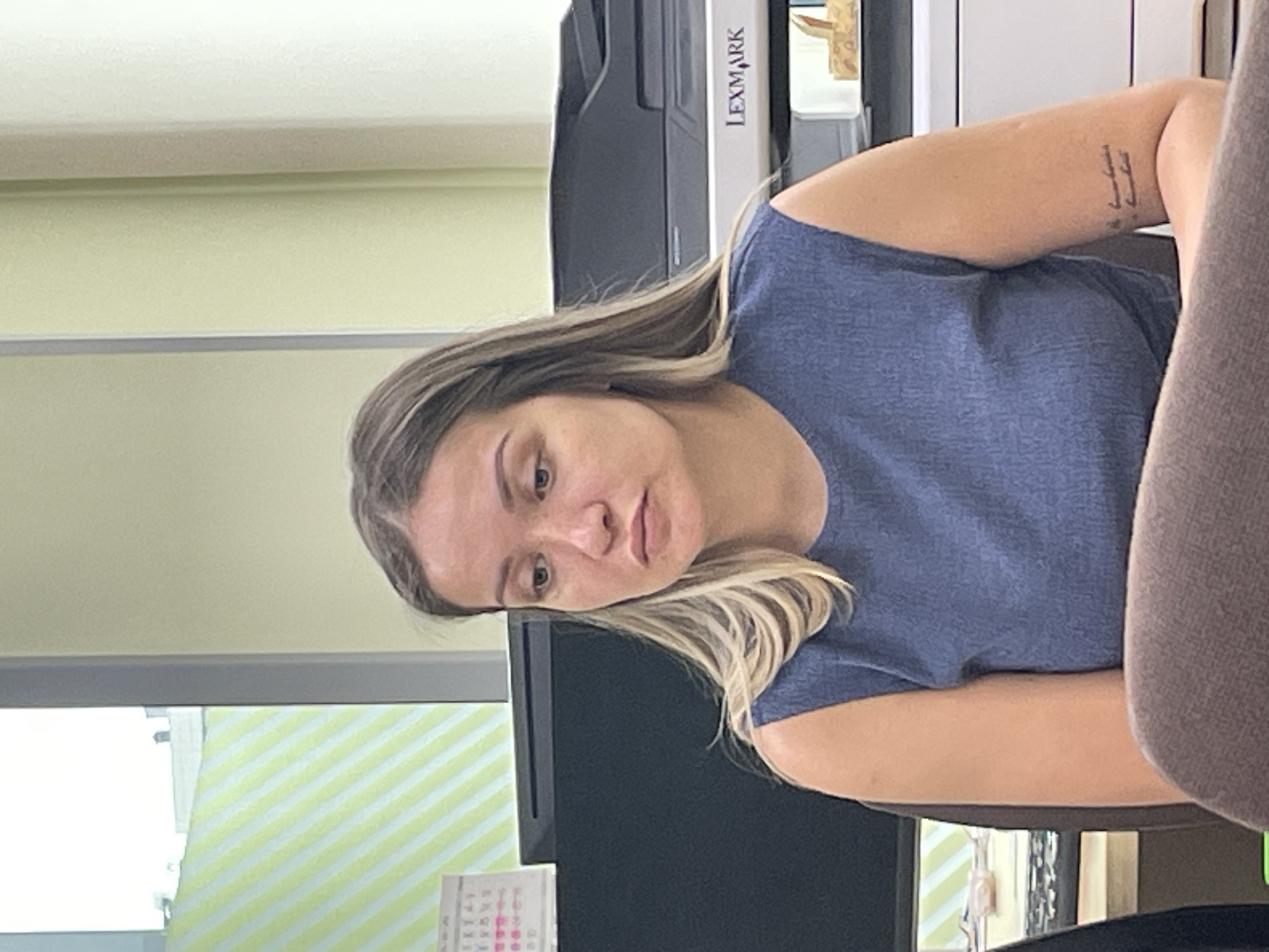 Woman photographed twice in Krasnoyarsk office workspace