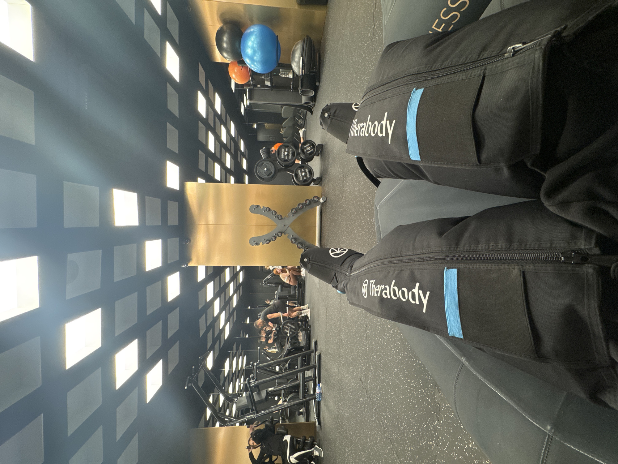 Person uses Therabody compression boots at Varna fitness center