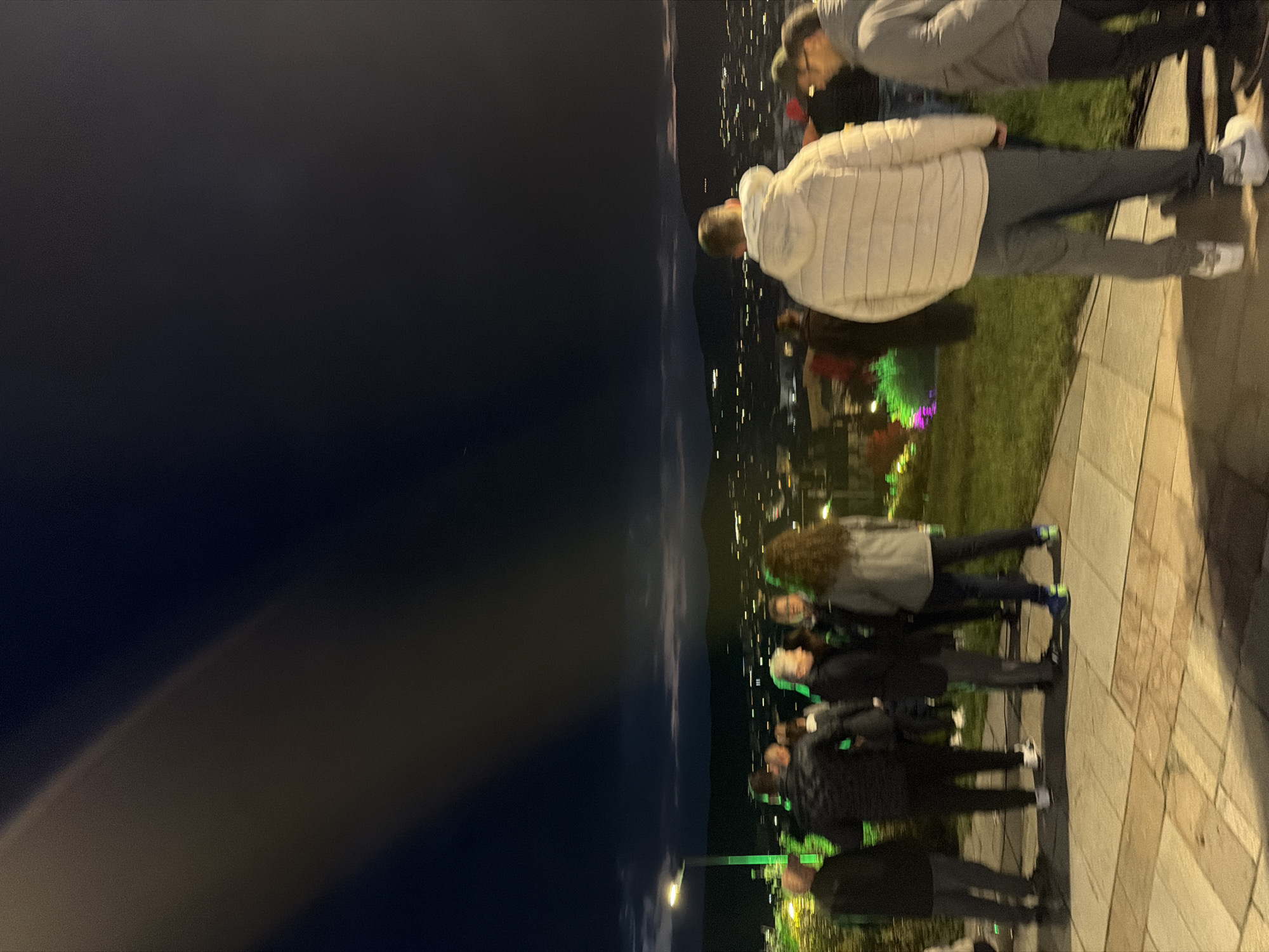 Evening visitors gather at Panagyurishte memorial complex at sunset