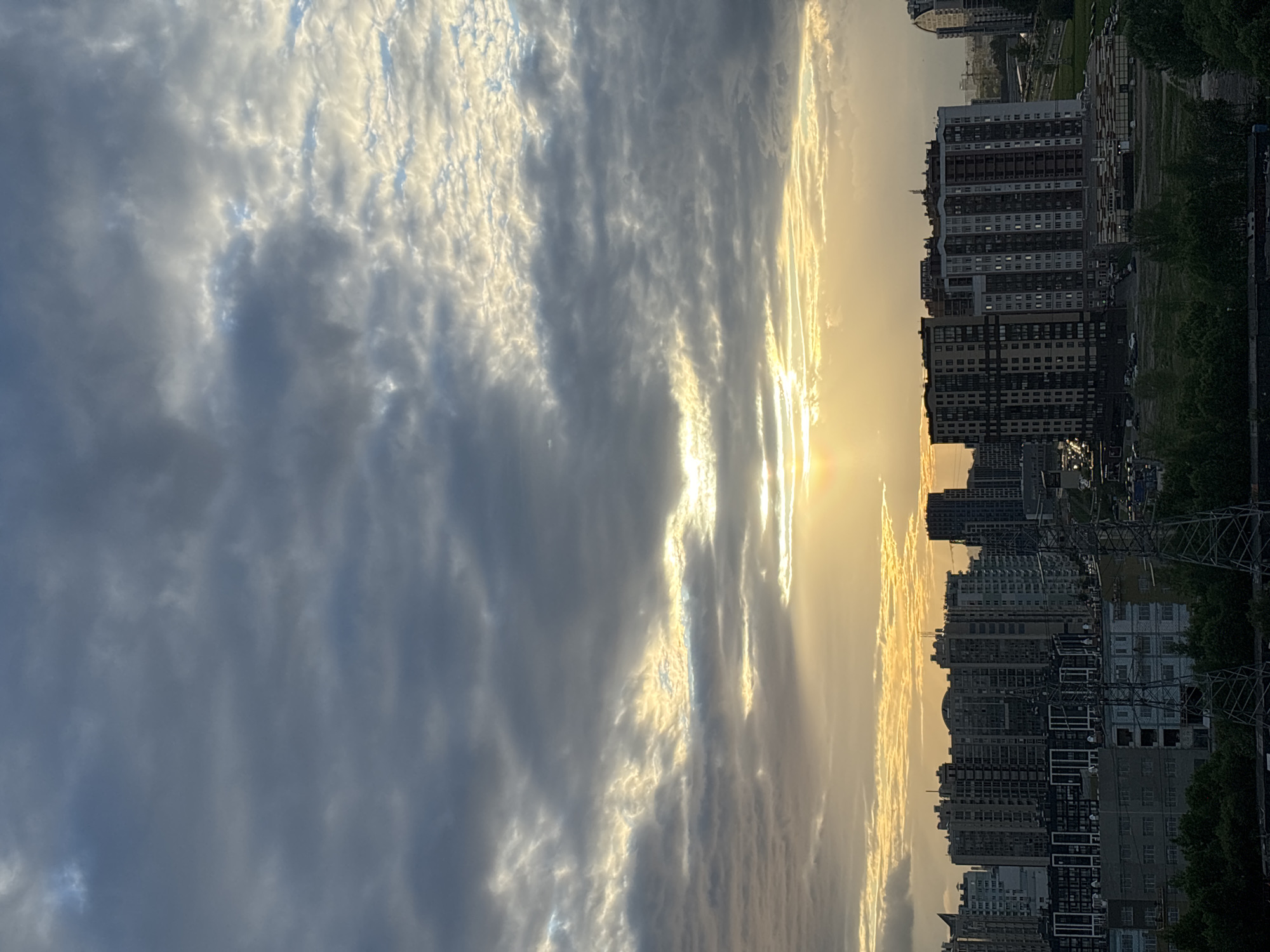 Urban sunset moments captured across city during golden hour