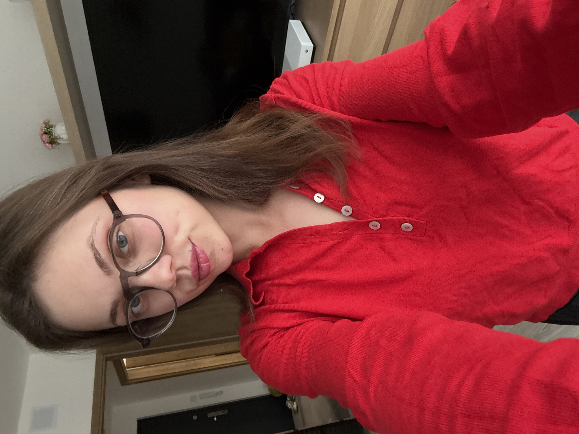 Woman takes selfie in home interior, Balatonlelle Hungary