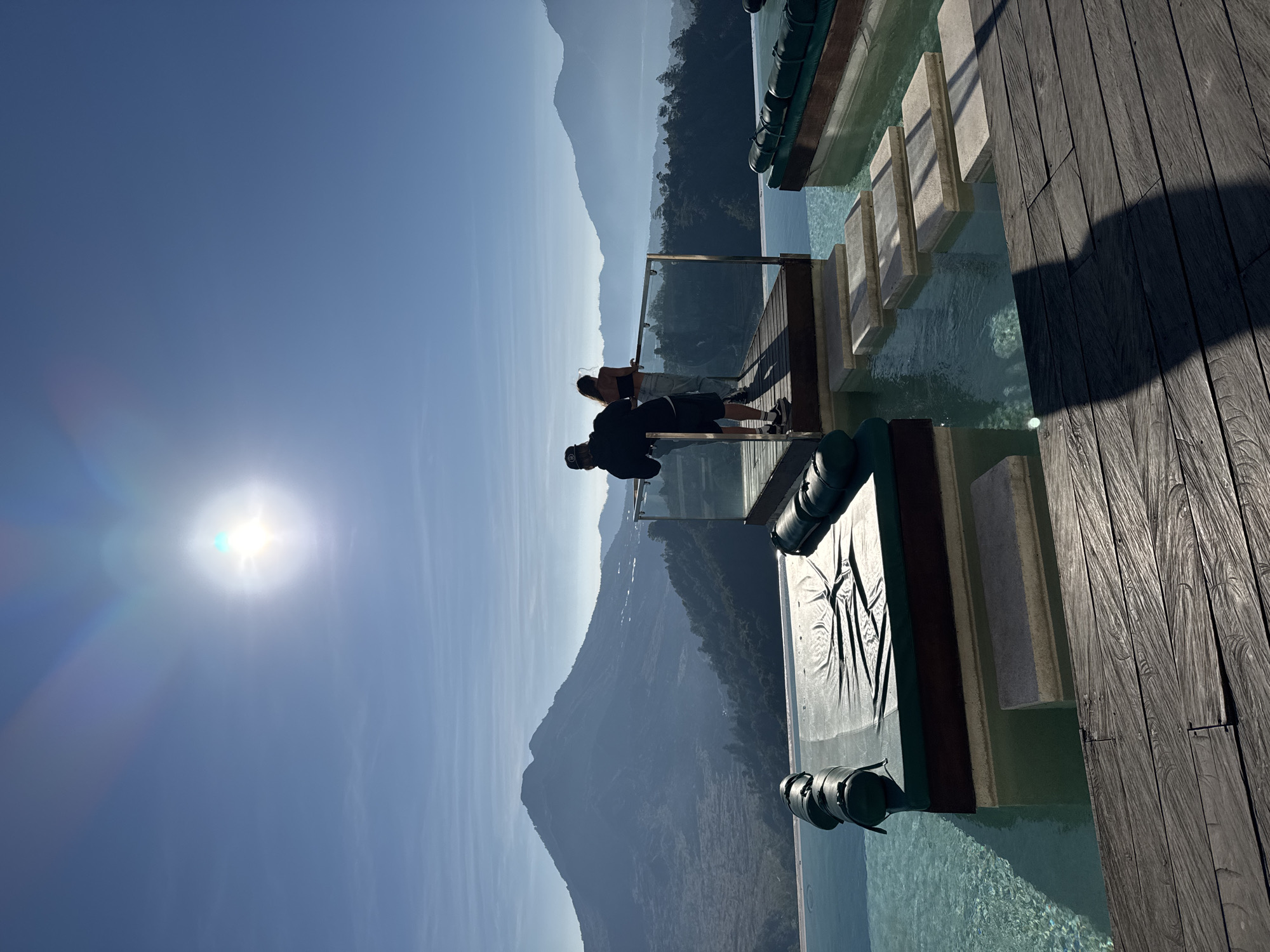 Two people spotted on Kintamani viewing platform overlooking volcanic mountains