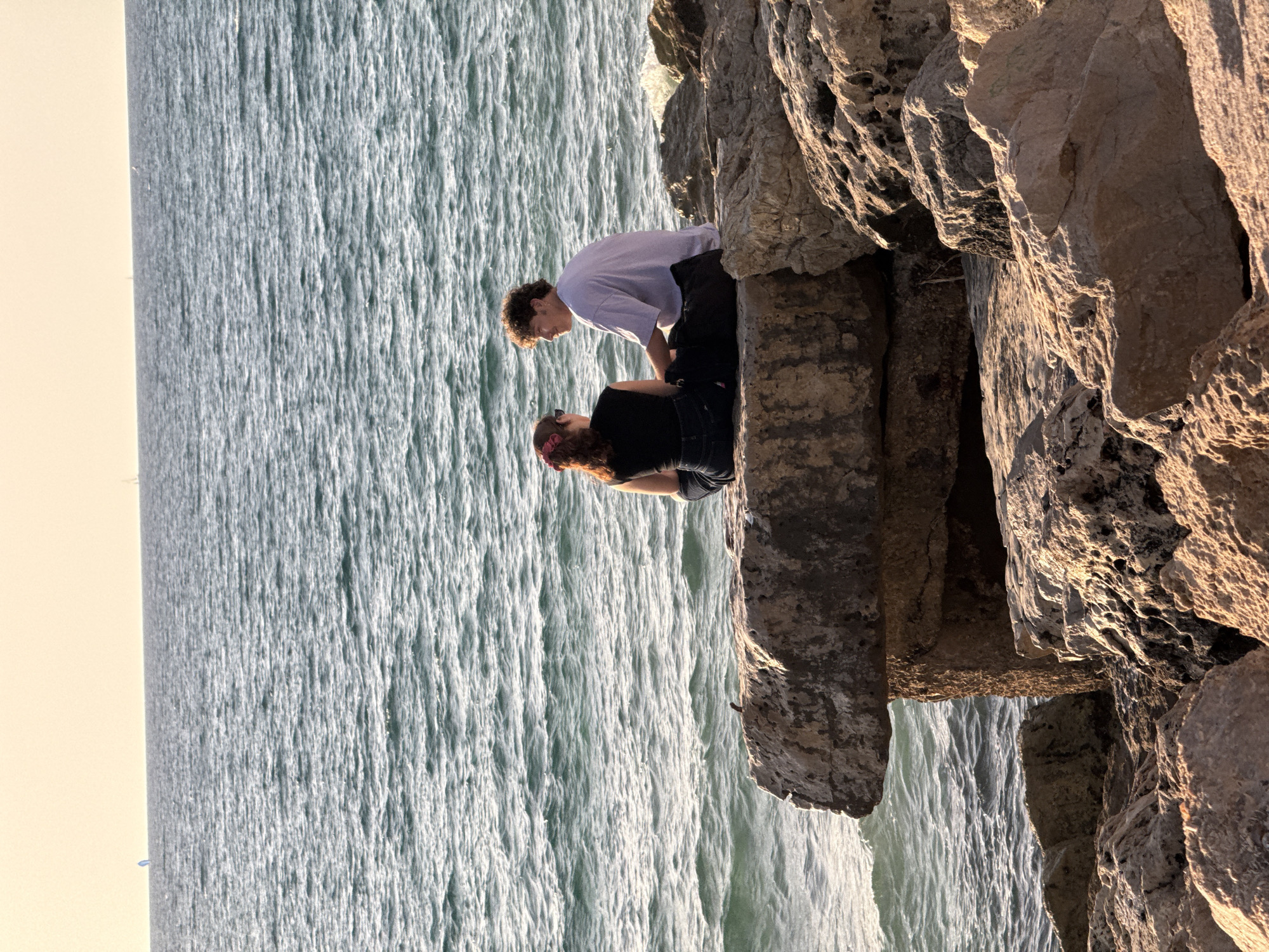 Tel Aviv residents enjoy Mediterranean coastline during summer afternoon