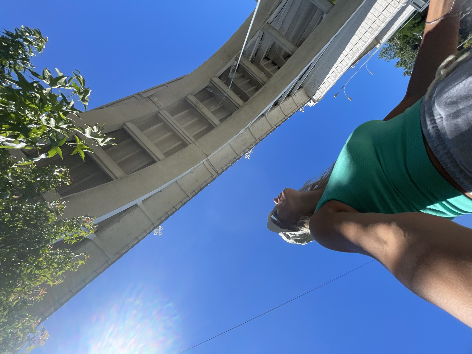 Looking up at a concrete bridge on a clear day in Sochi