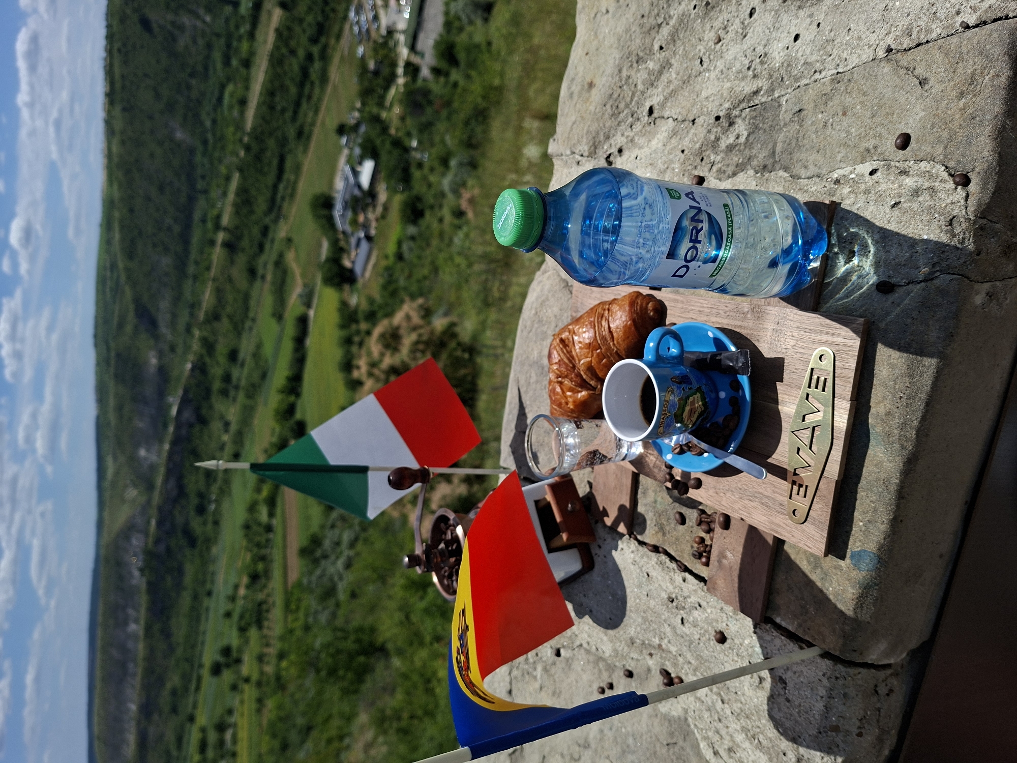 Outdoor breakfast in Trebujeni with Italian and Moldovan flags