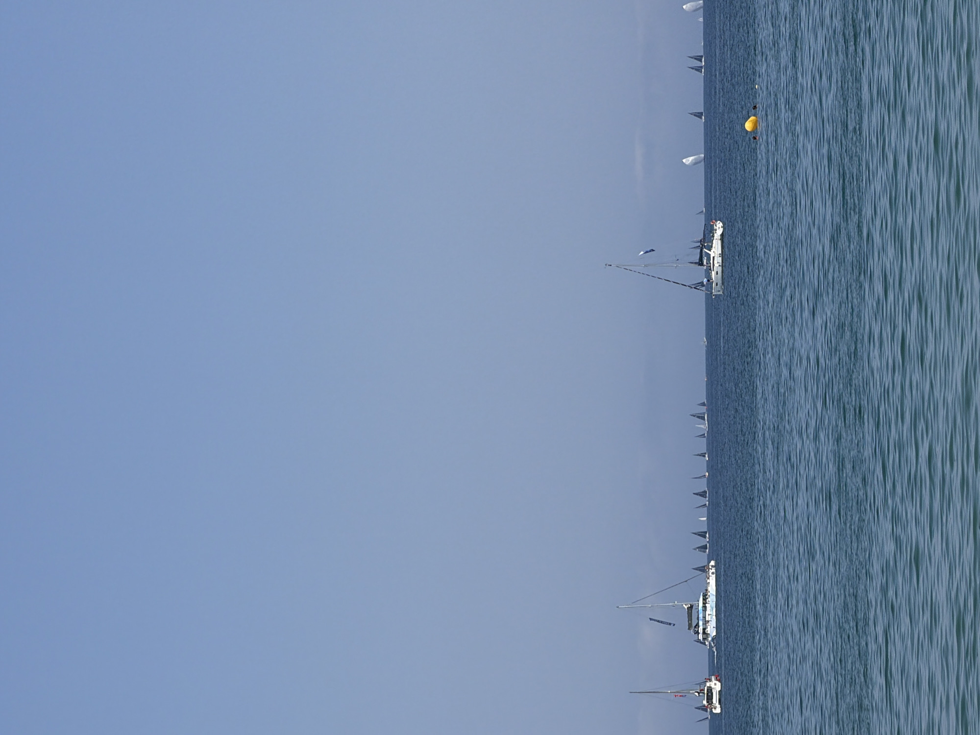 Barcelona coastal activities include sailing regatta and beach scenes