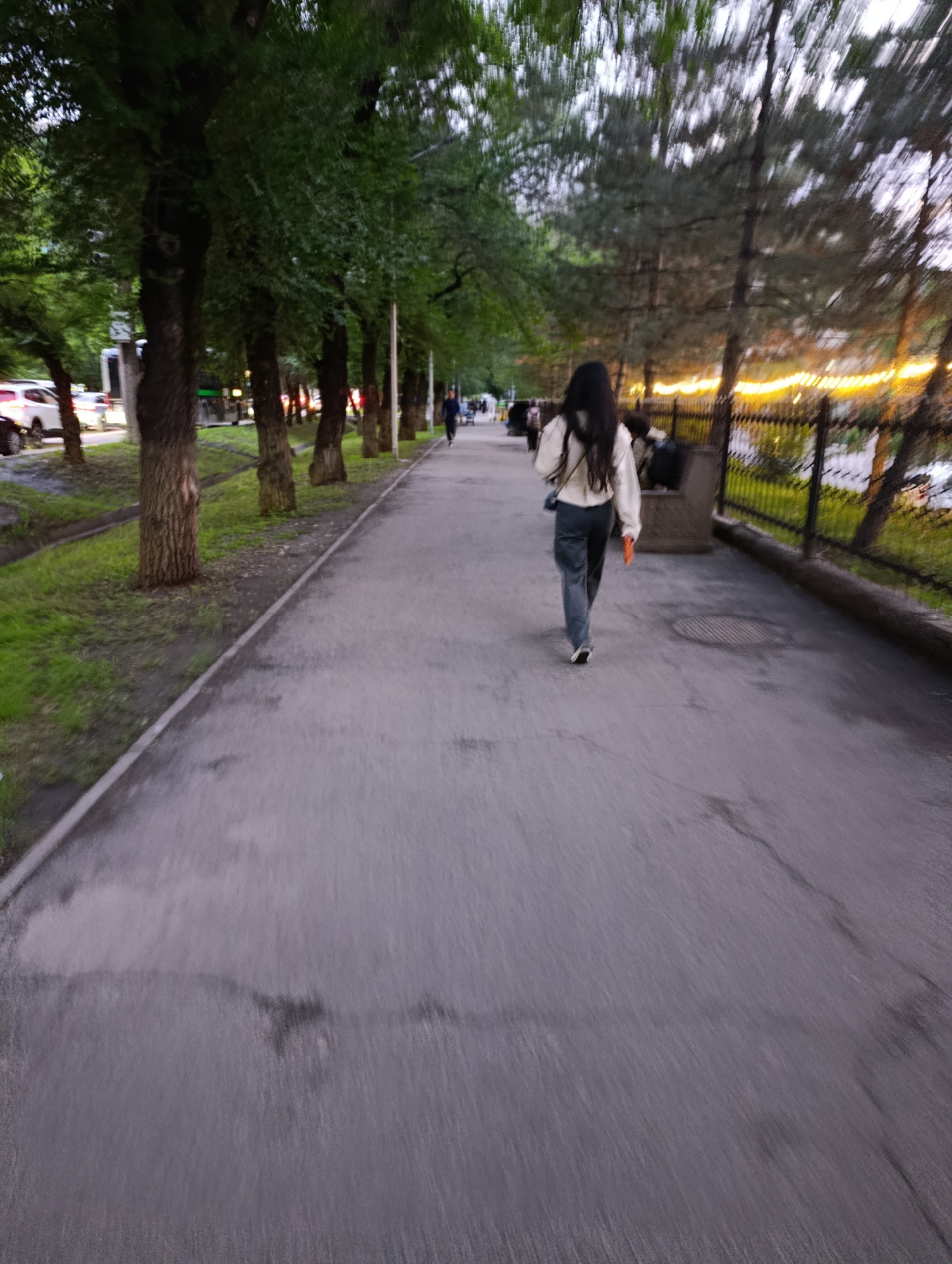 Ordinary afternoon street life documented across Almaty neighborhoods