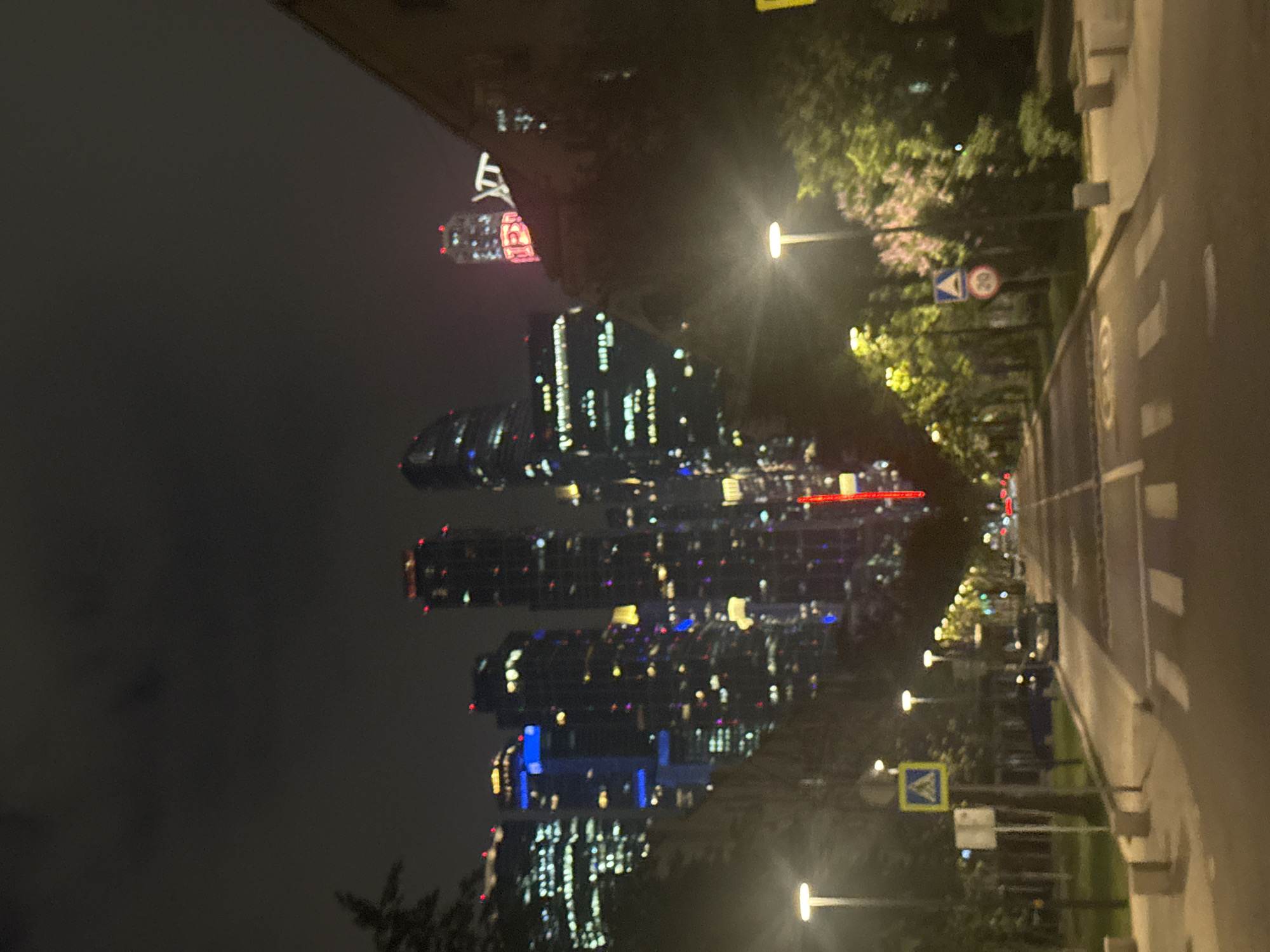 Moscow City skyscrapers photographed at night from street level