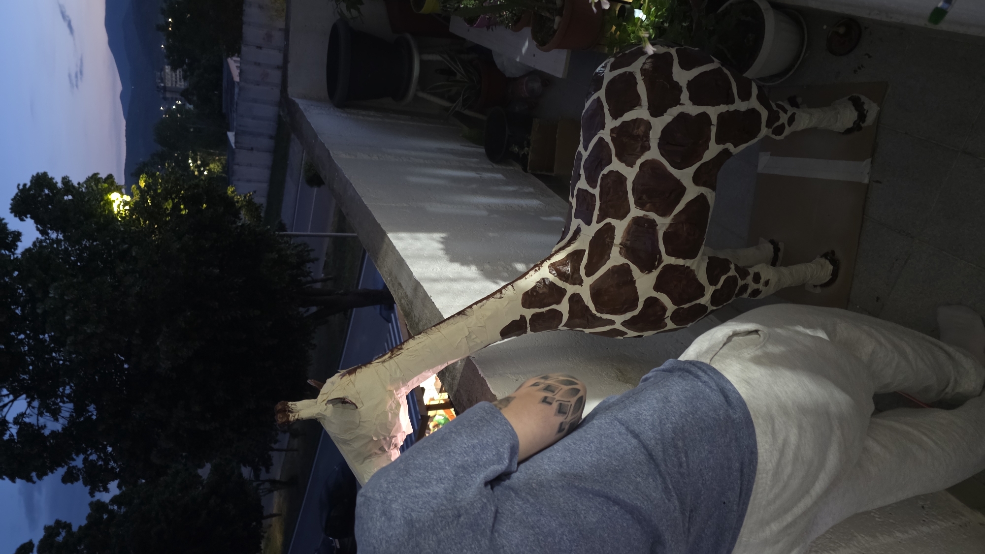 Artist Creates Life-Size Papier-Mâché Giraffe Sculpture on Blagoevgrad Balcony