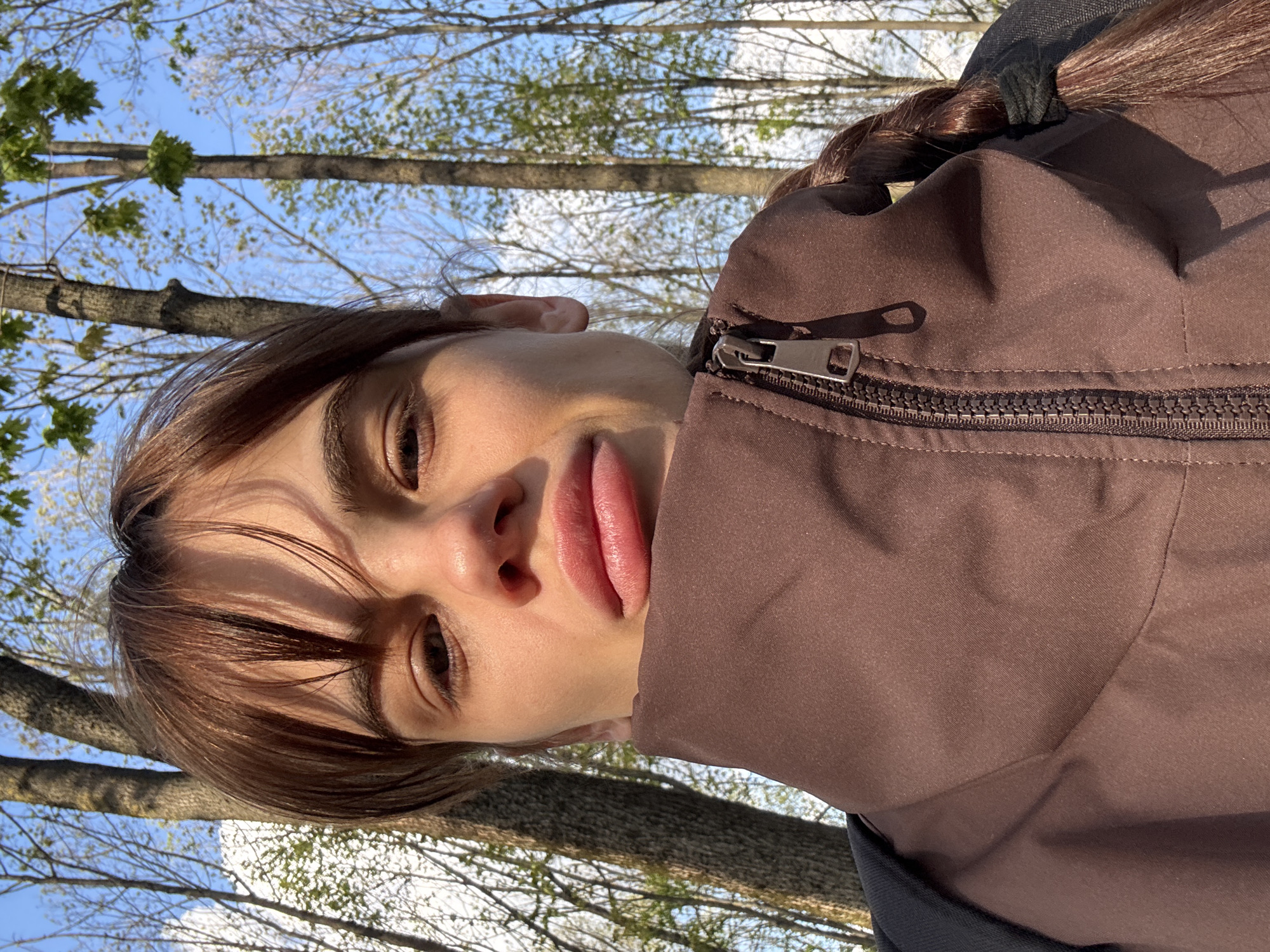 Young woman takes selfie session in Rostov-on-Don park