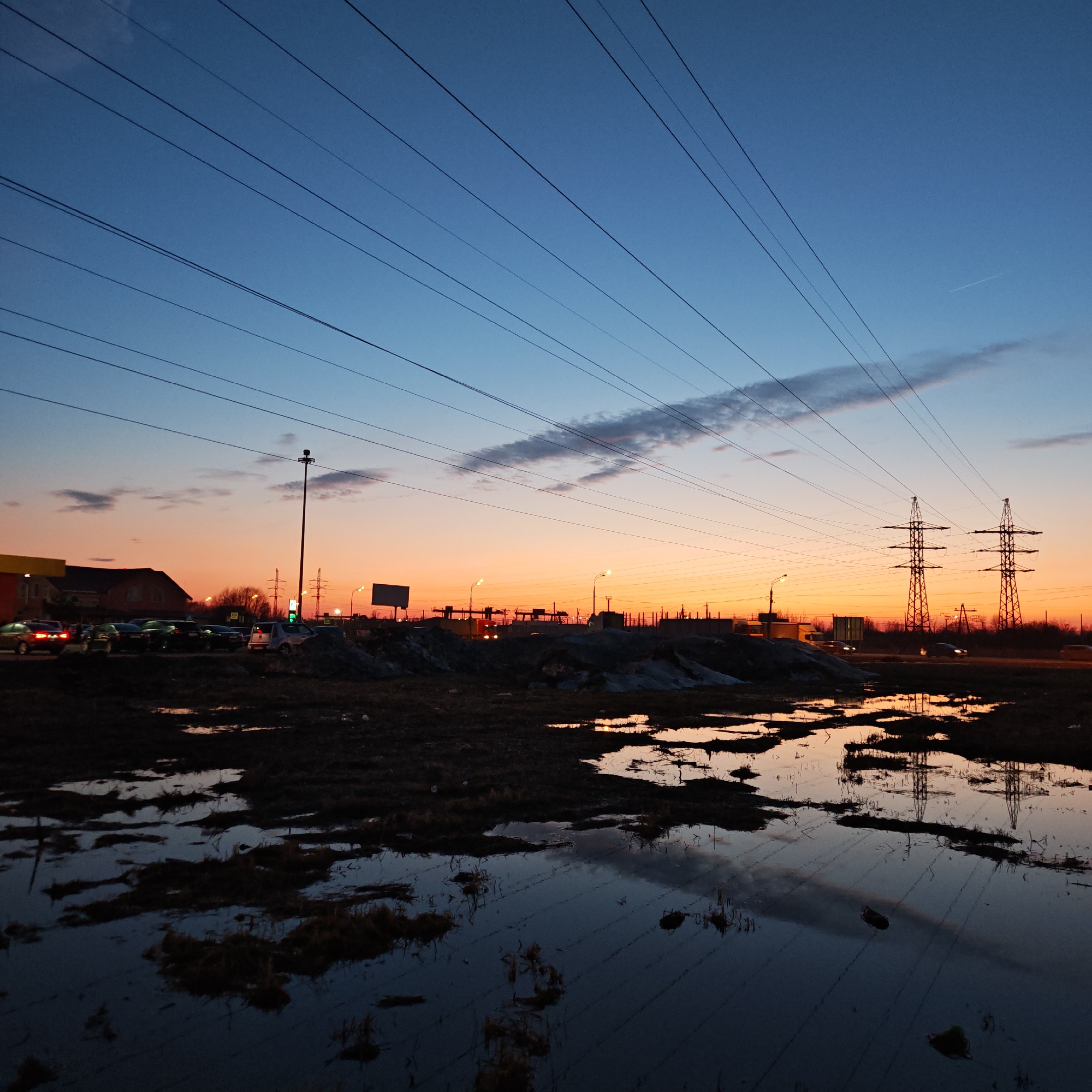 Dusk landscape captured in Rostov urban outskirts with muddy field