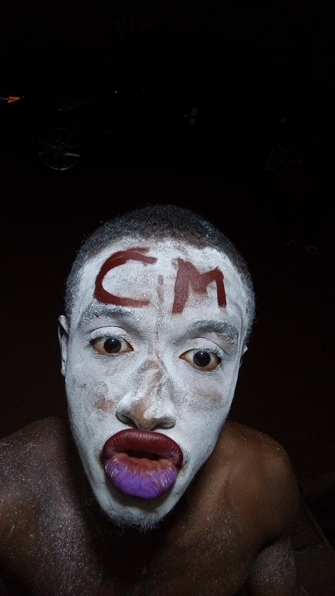 Traditional face painting ceremony documented at Onitsha entertainment venue