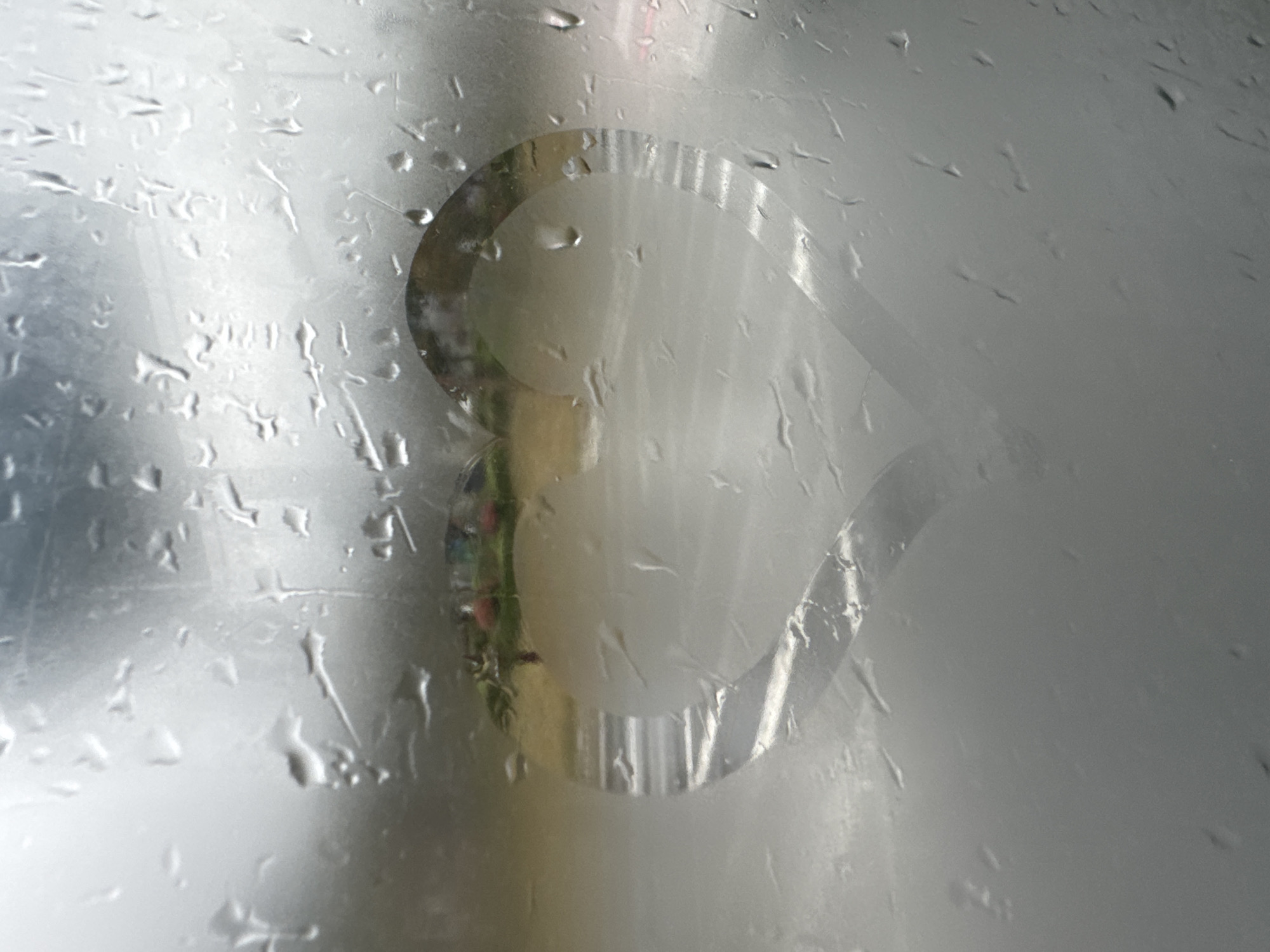 Heart shape appears in water droplets on surface