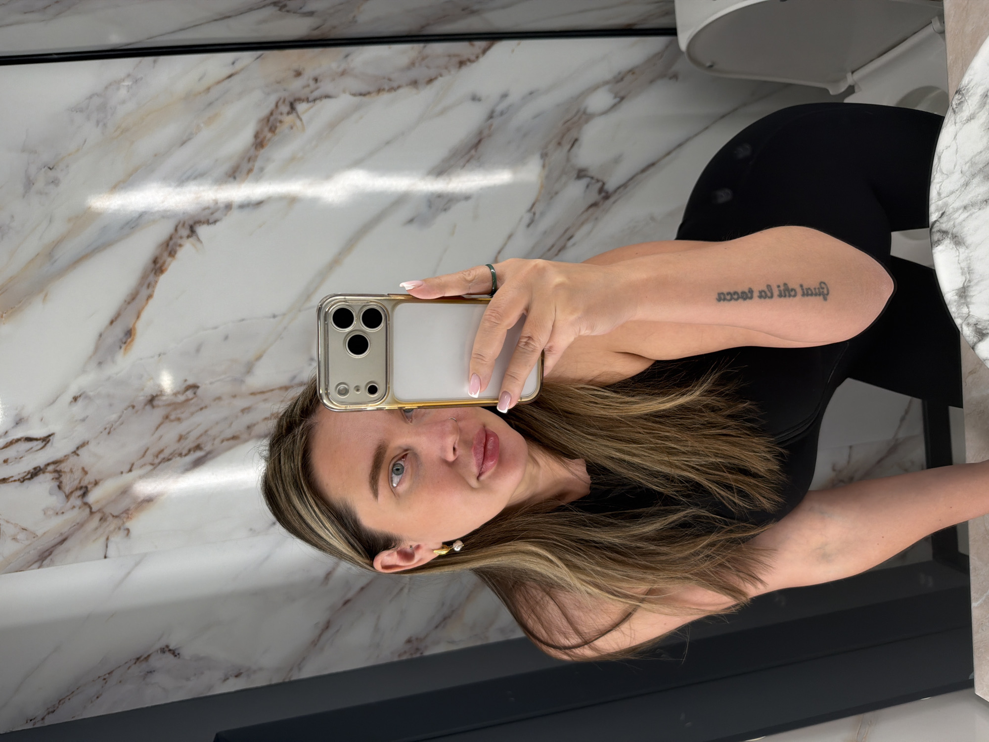 Woman takes bathroom selfie in Moscow