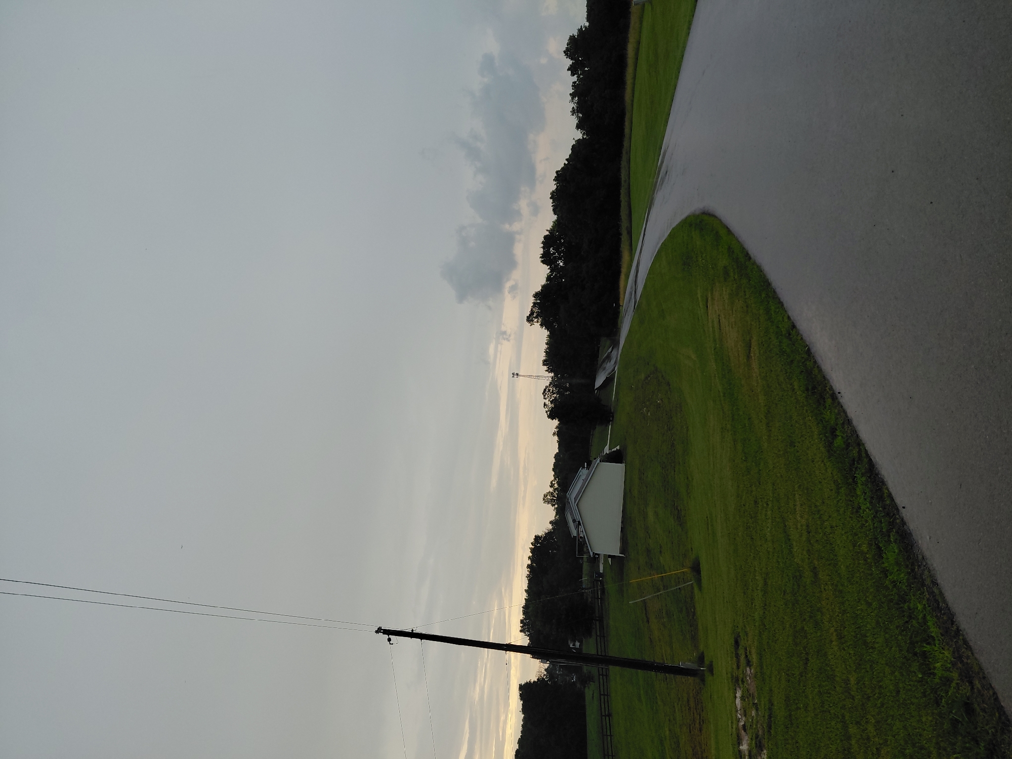 Rural roads and a pond on a quiet overcast day in Bagdad